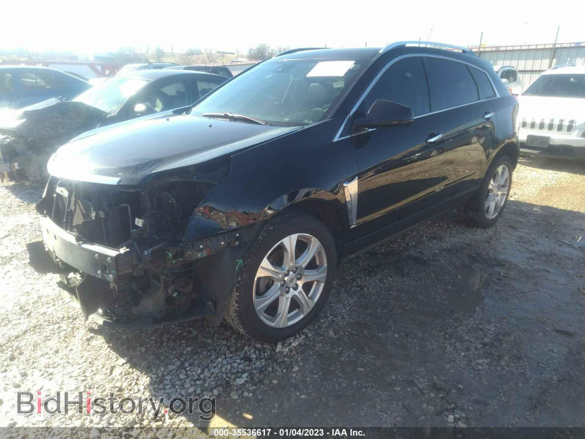 2013 CADILLAC SRX - VIN: 3GYFNDE39DS583778 - Фото 2