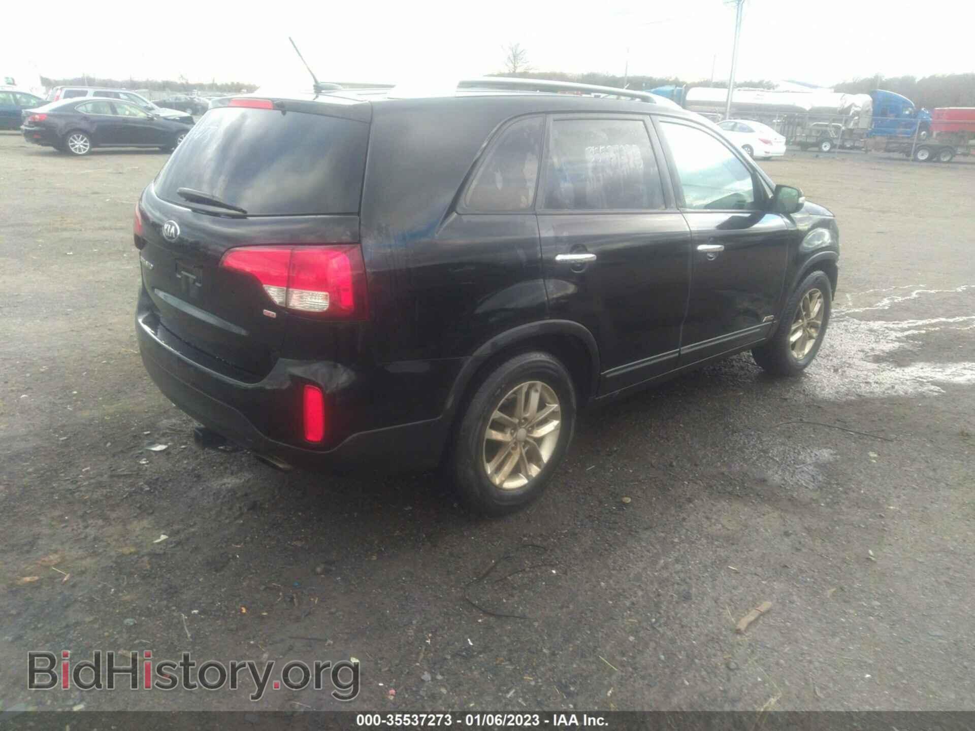 2015 KIA SORENTO - VIN: 5XYKTDA72FG589302 - Photo 4