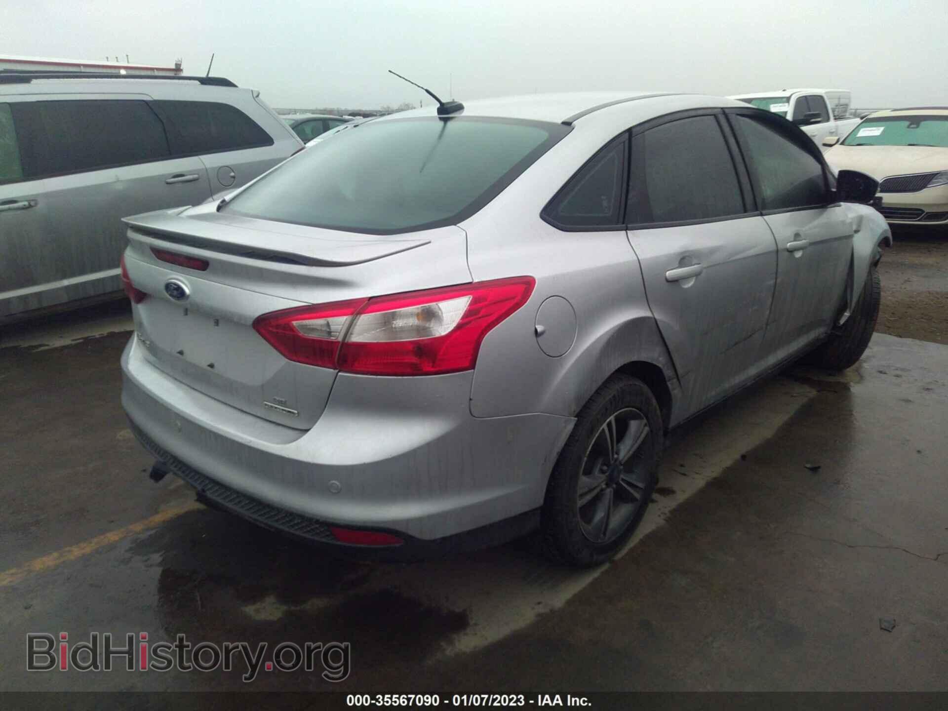2014 FORD FOCUS - VIN: 1FADP3F20EL406332 - Photo 4