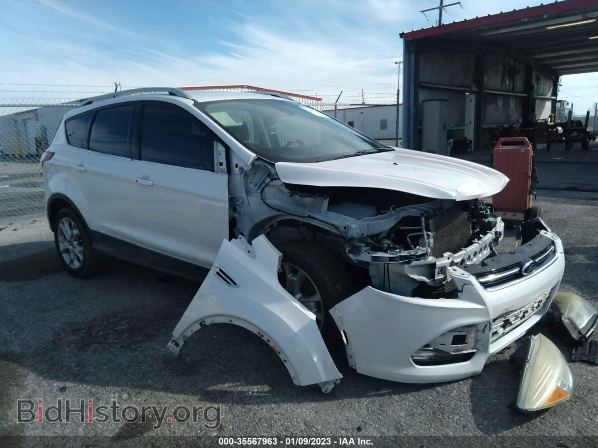 Фотография 1FMCU0J91EUE55353 - FORD ESCAPE 2014