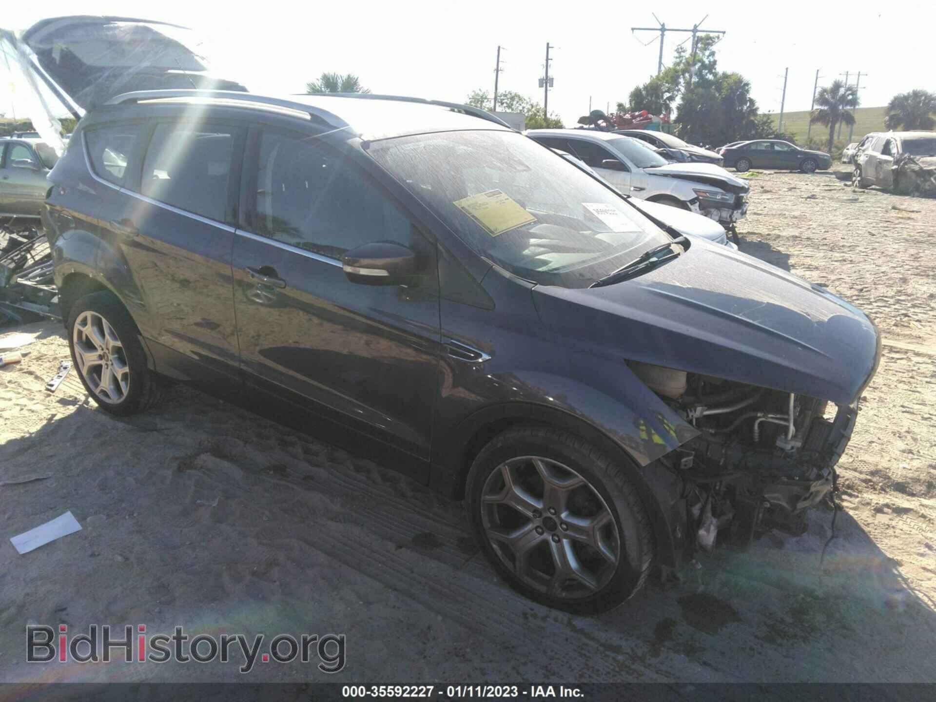 Фотография 1FMCU0J98HUA99701 - FORD ESCAPE 2017