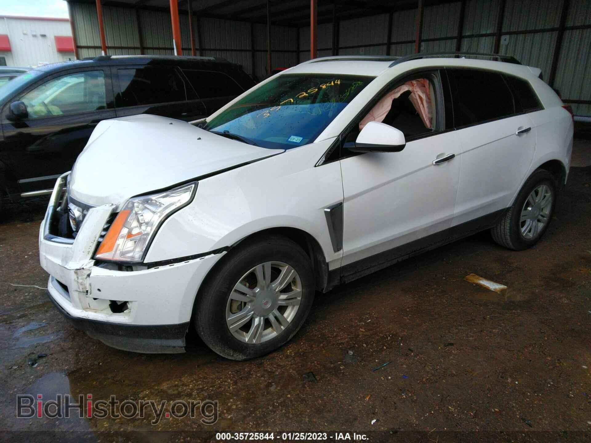 2014 CADILLAC SRX - VIN: 3GYFNBE37ES539560 - Фото 2
