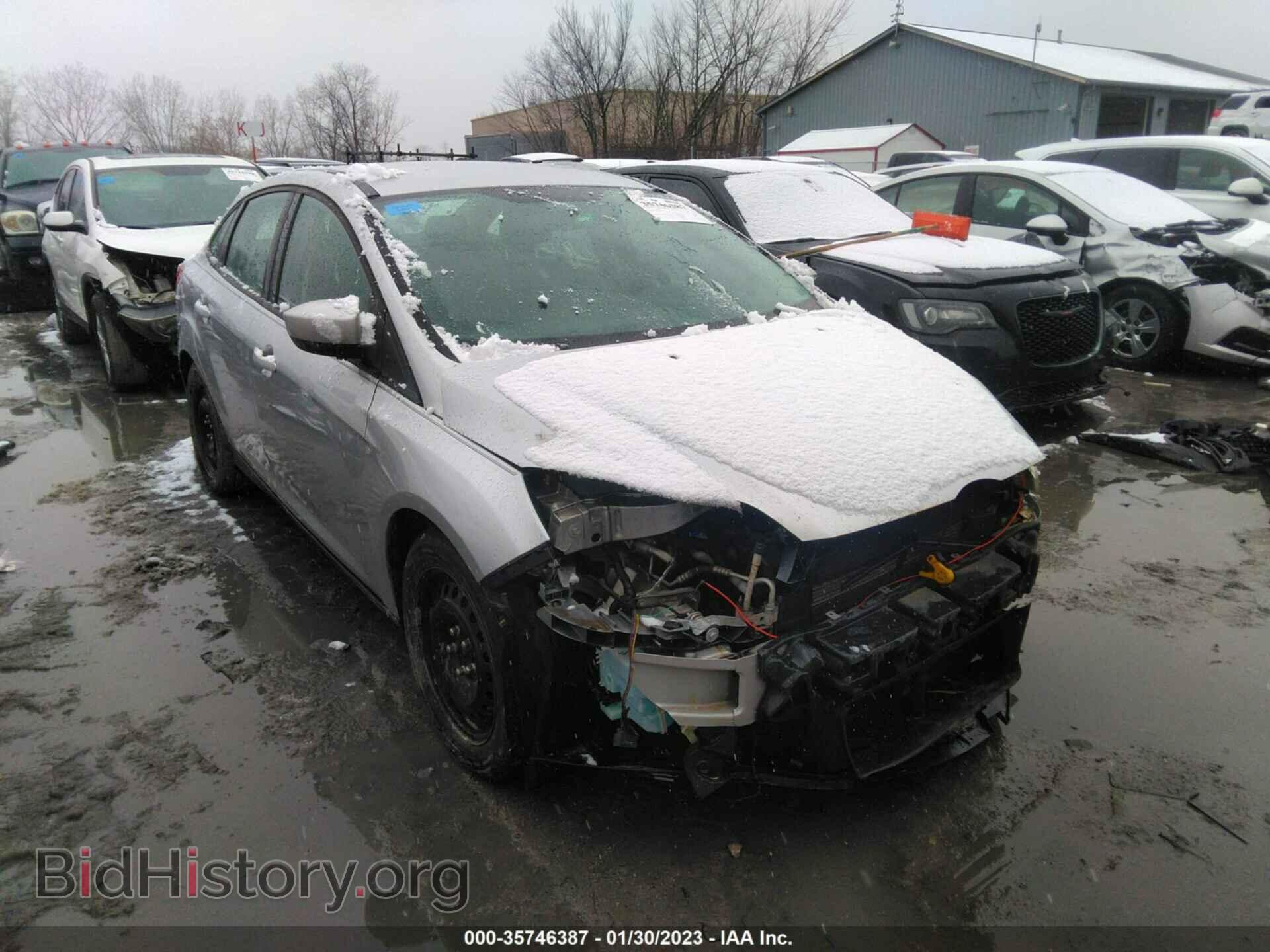 Фотография 1FAHP3F23CL104595 - FORD FOCUS 2012