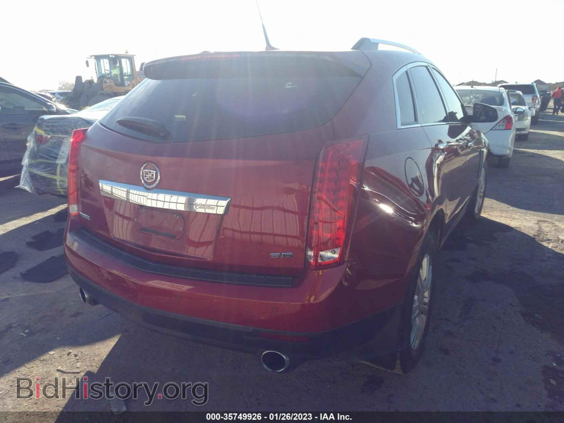 2013 CADILLAC SRX - VIN: 3GYFNCE30DS610618 - Фото 4