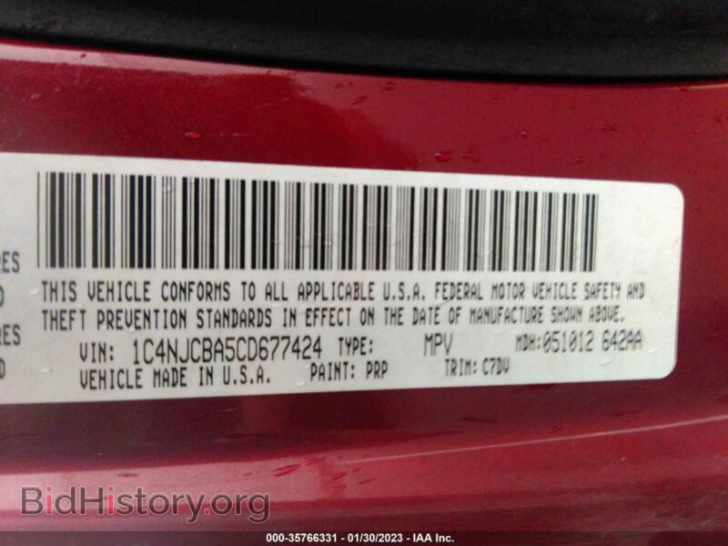 2012 Jeep COMPASS (VIN 1C4NJCBA5CD677424) — photo 9 of 11