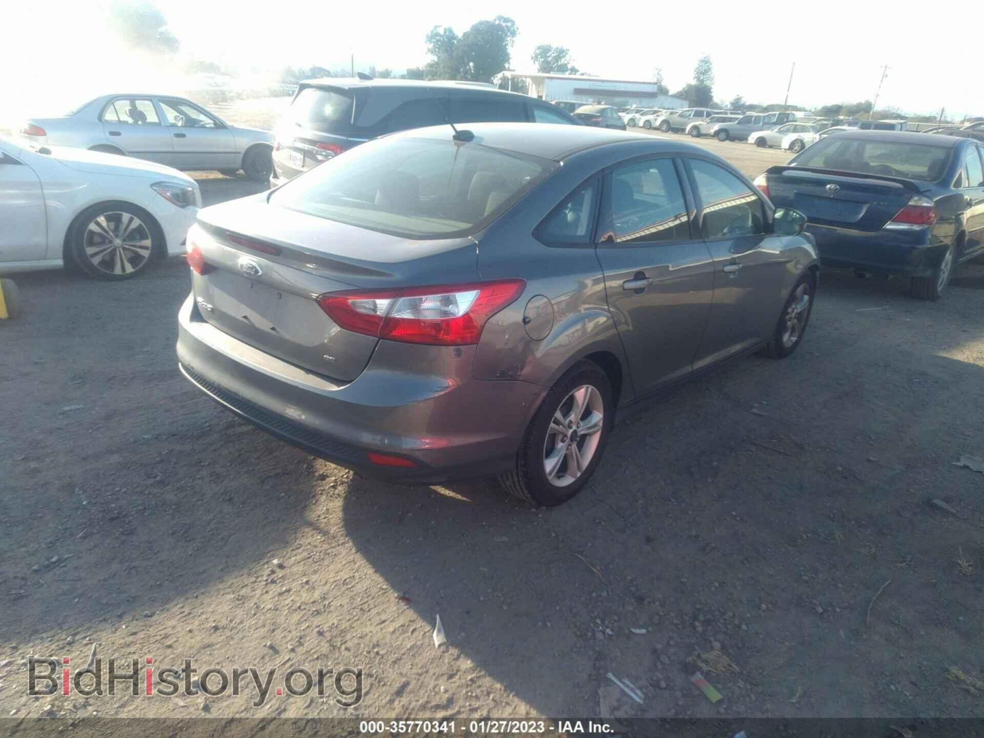 2014 FORD FOCUS - VIN: 1FADP3F24EL442704 - Photo 4