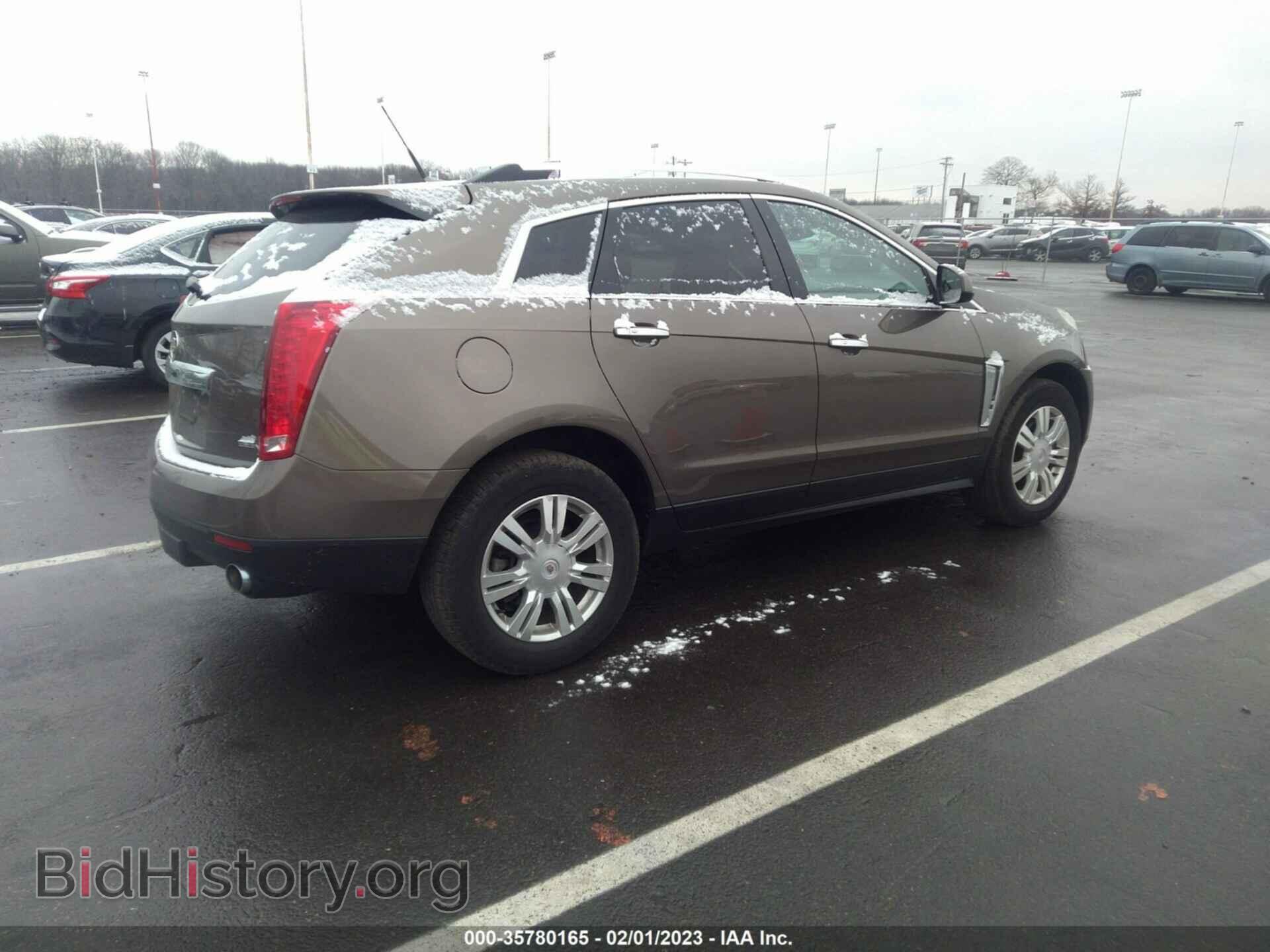 2014 CADILLAC SRX - VIN: 3GYFNEE30ES615816 - Фото 4