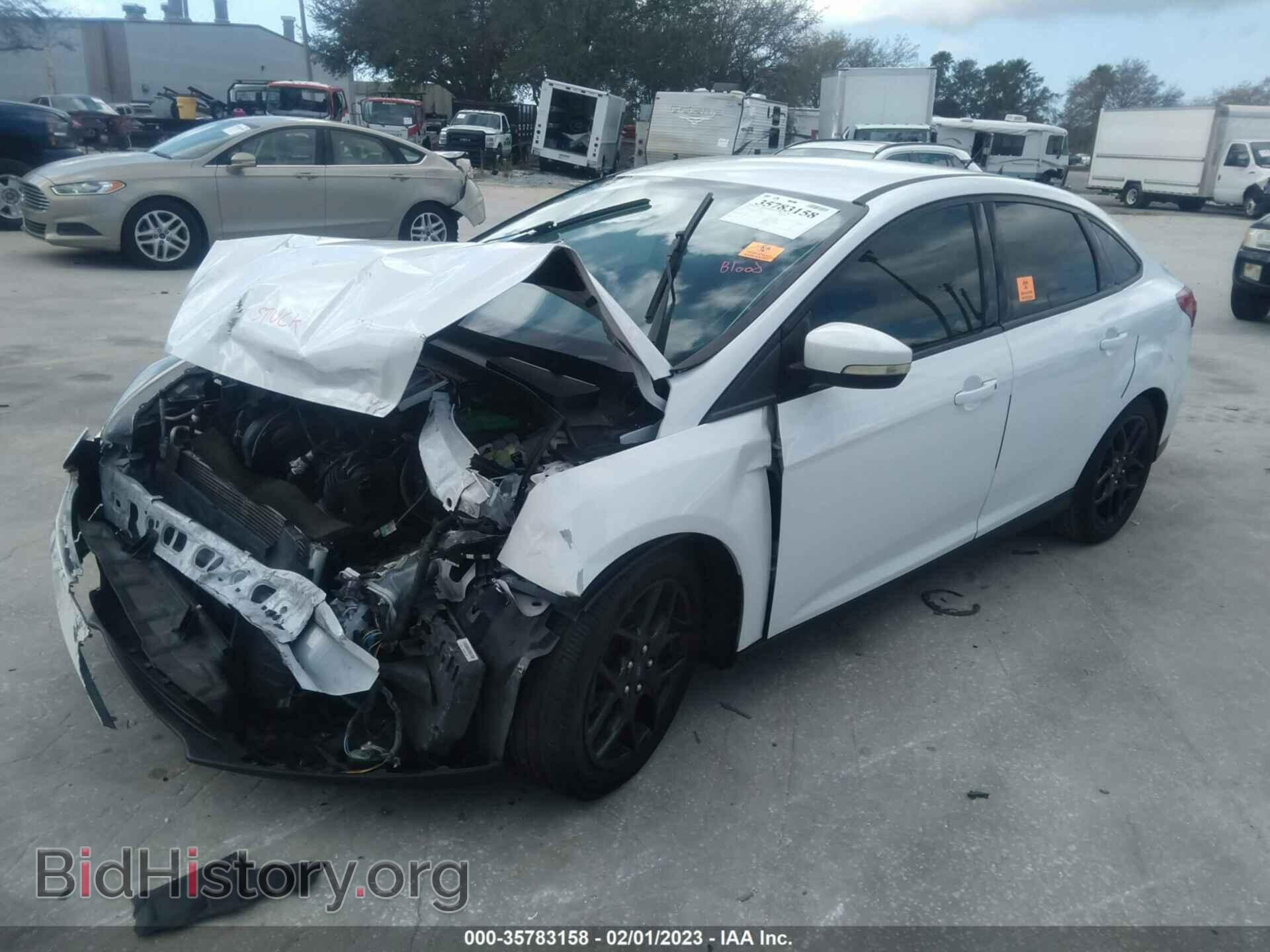 2016 FORD FOCUS - VIN: 1FADP3F25GL321103 - Фото 2