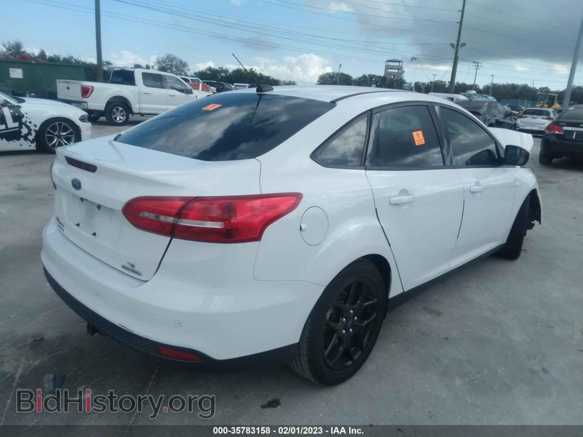 2016 FORD FOCUS - VIN: 1FADP3F25GL321103 - Фото 4