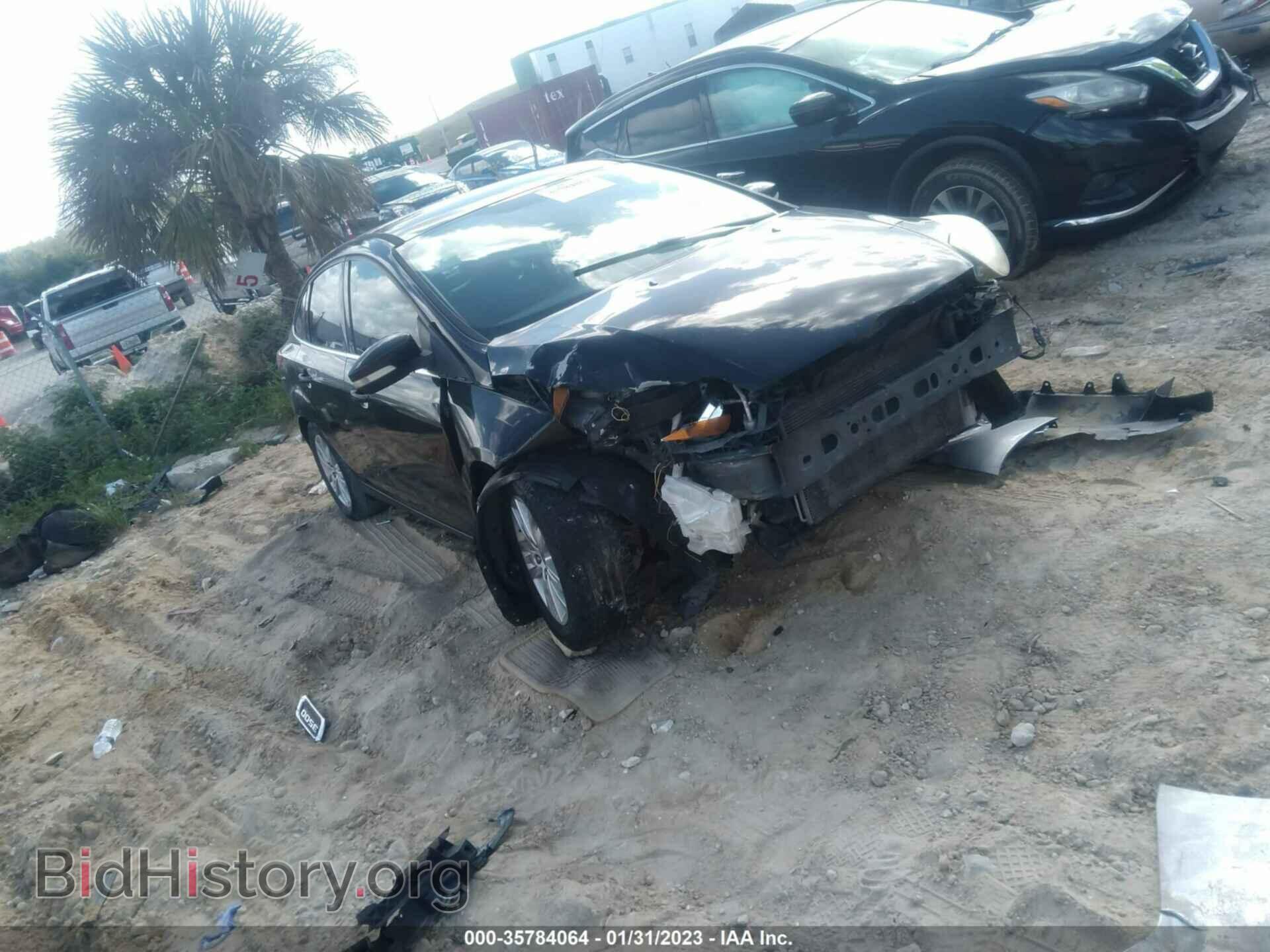 Фотография 1FAHP3H26CL123123 - FORD FOCUS 2012