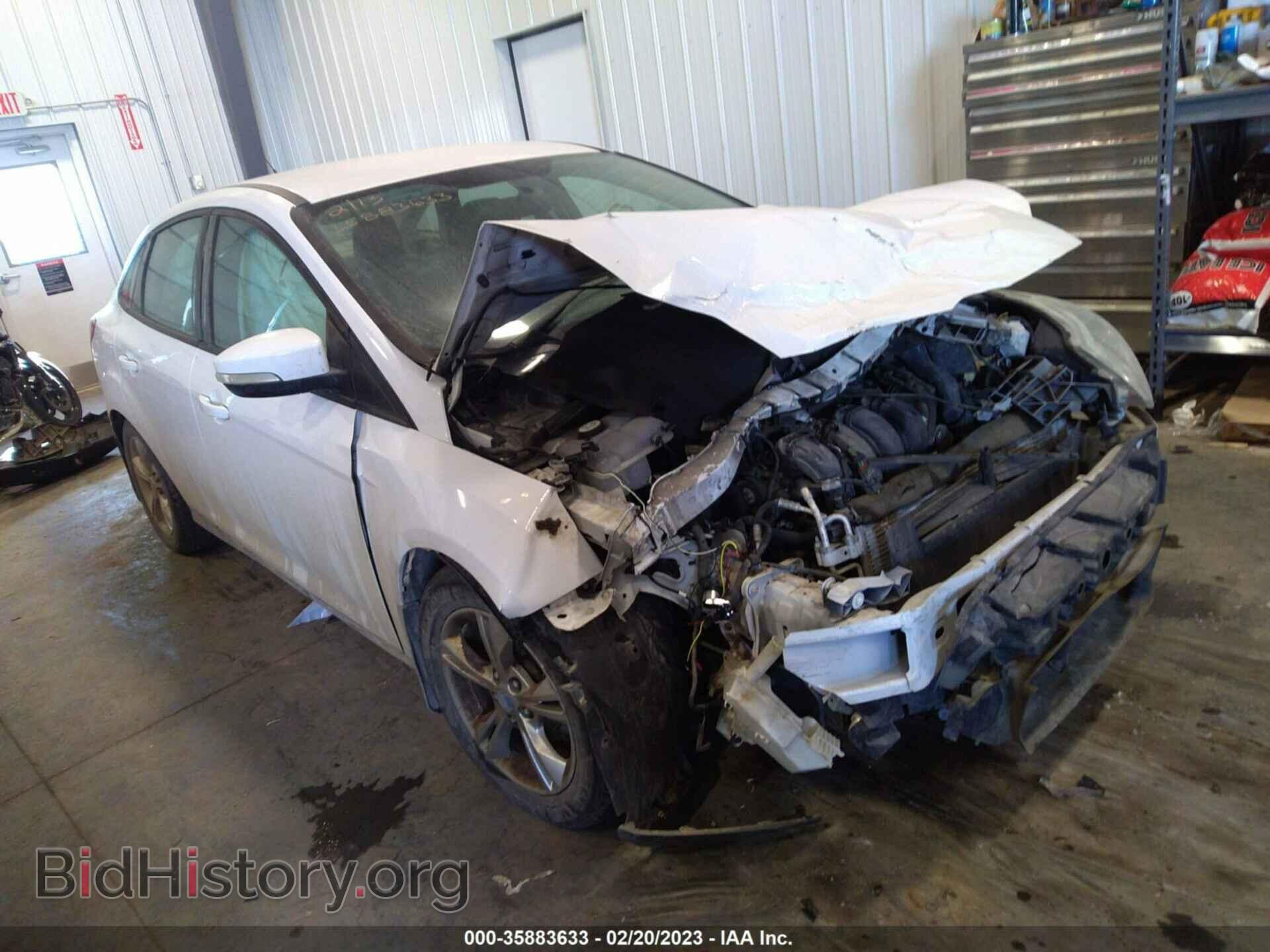 Фотография 1FADP3F26EL123448 - FORD FOCUS 2014