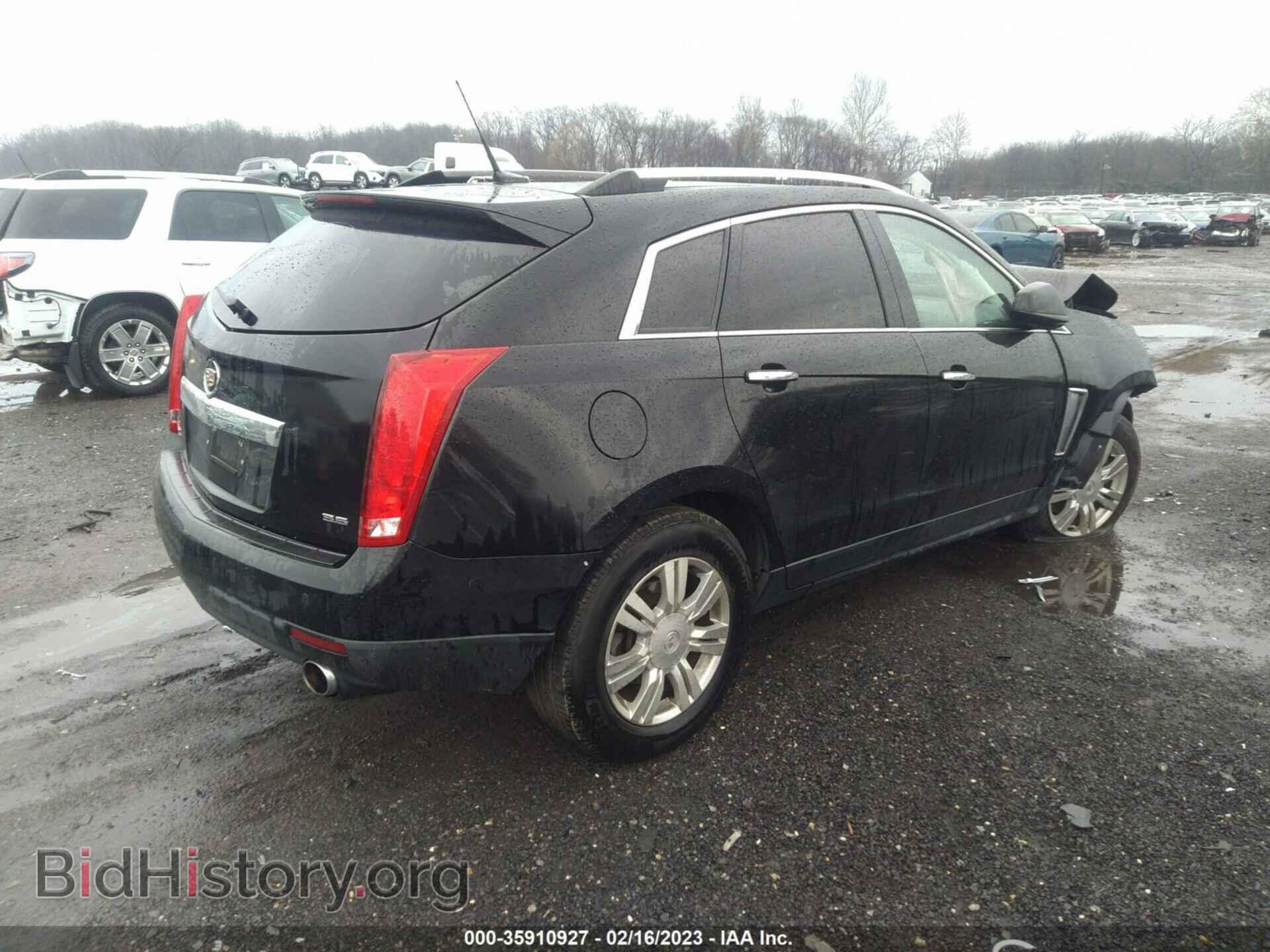 2014 CADILLAC SRX - VIN: 3GYFNBE39ES525739 - Фото 4