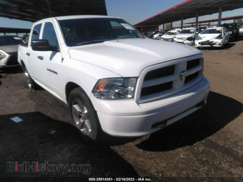 2012 RAM 1500 ST (VIN 1C6RD7KP7CS319412) — photo 1 of 11, IAAI, damage: left side