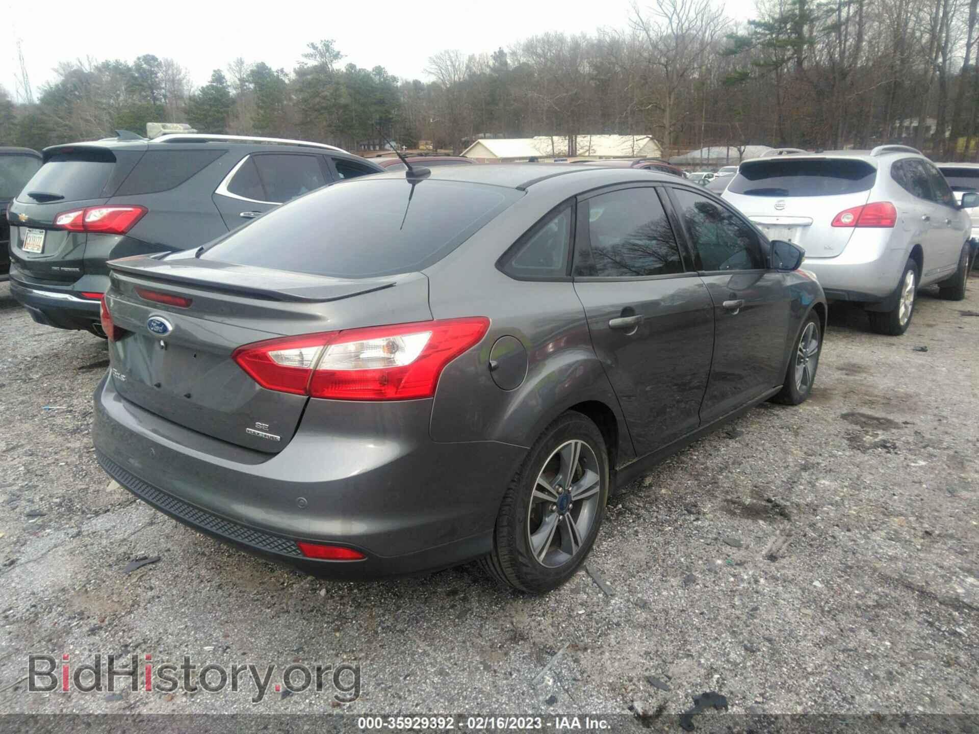 2014 FORD FOCUS - VIN: 1FADP3F29EL309565 - Photo 4