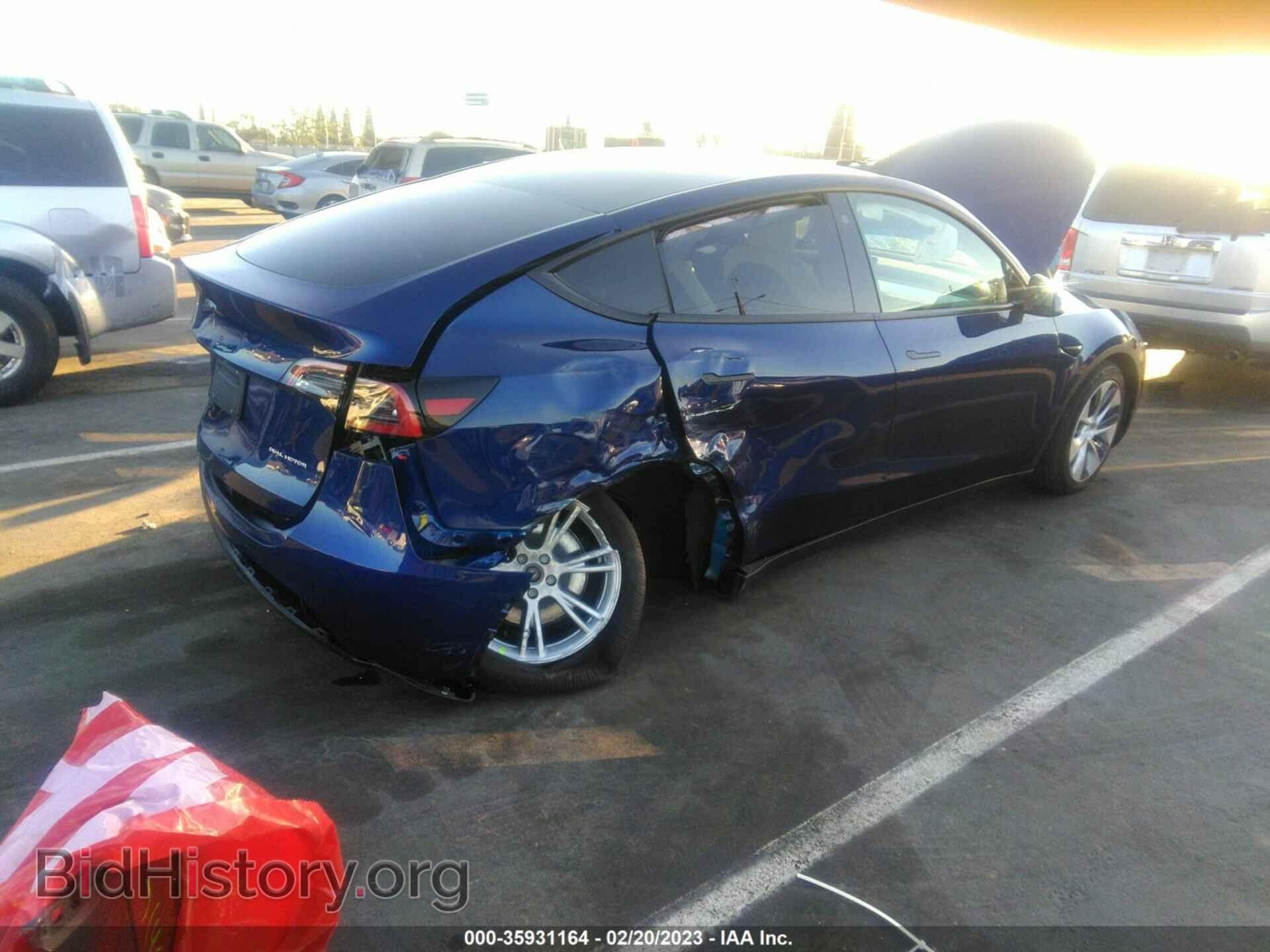 2023 TESLA MODEL Y - VIN: 7SAYGDEE2PF623032 - Фото 4