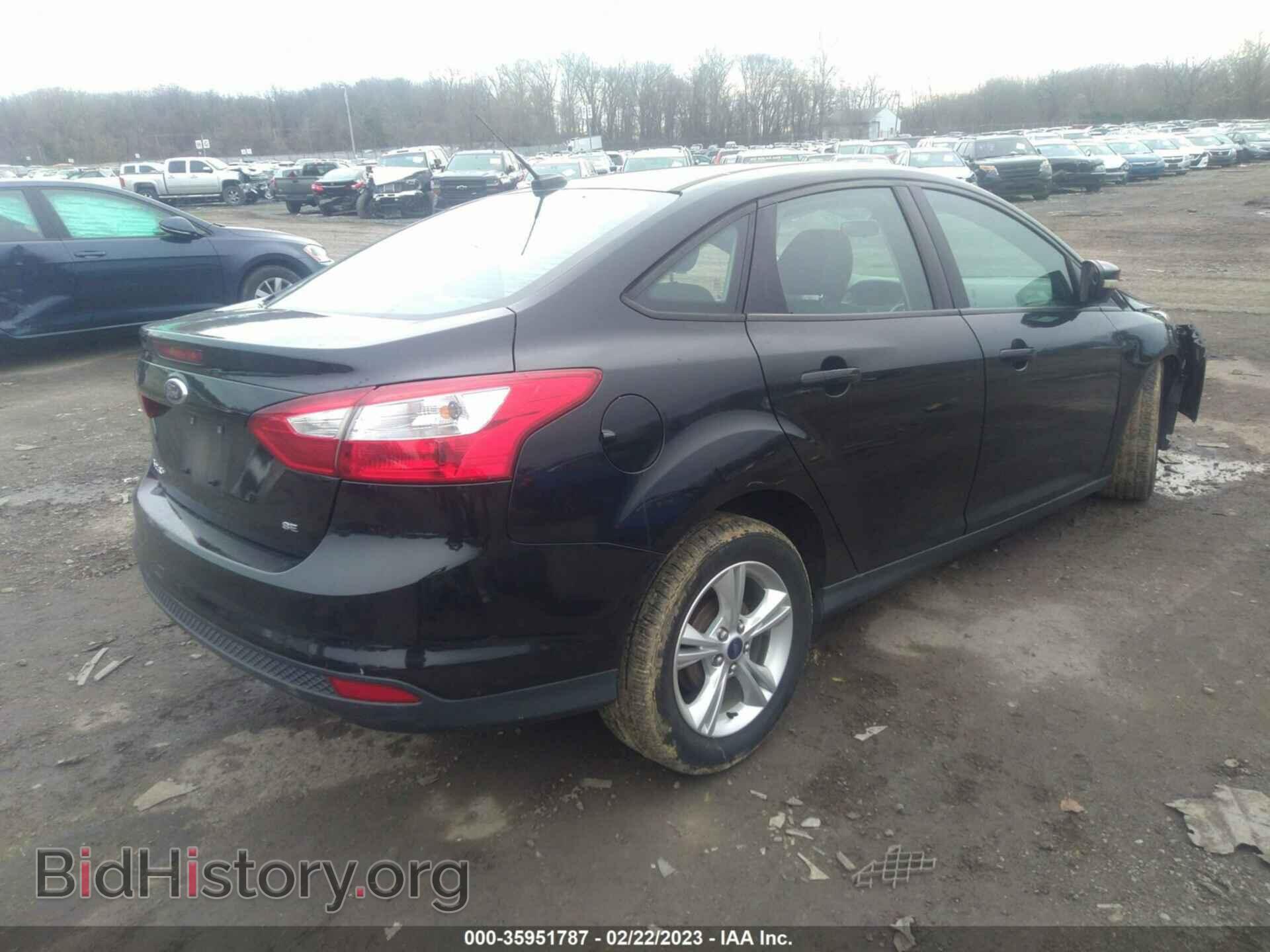 2014 FORD FOCUS - VIN: 1FADP3F20EL344429 - Photo 4