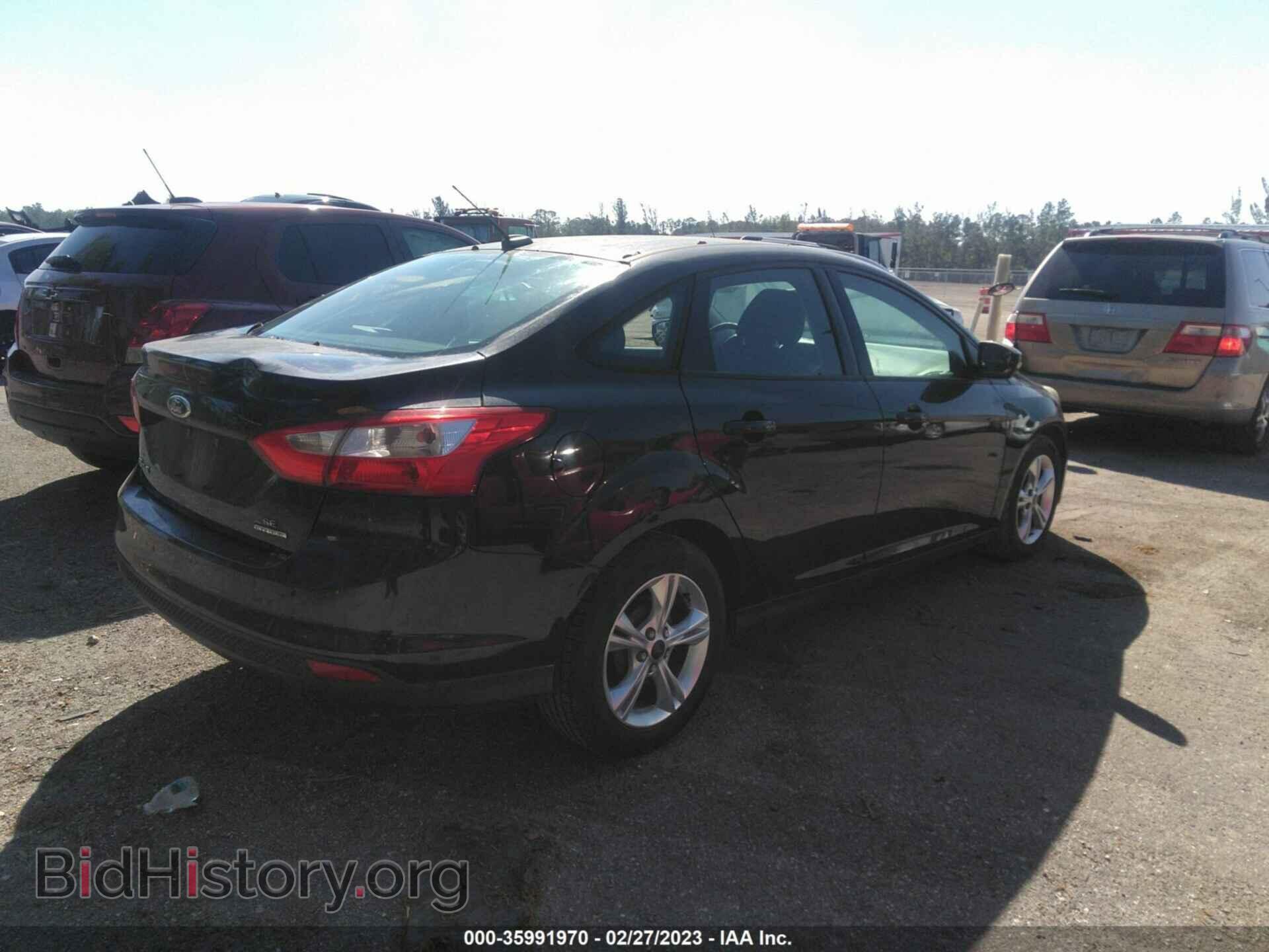2014 FORD FOCUS - VIN: 1FADP3F29EL332893 - Photo 4