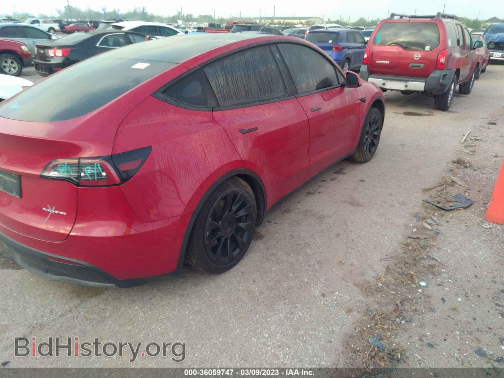 2022 TESLA MODEL Y - VIN: 7SAYGAEE2NF337810 - Photo 4