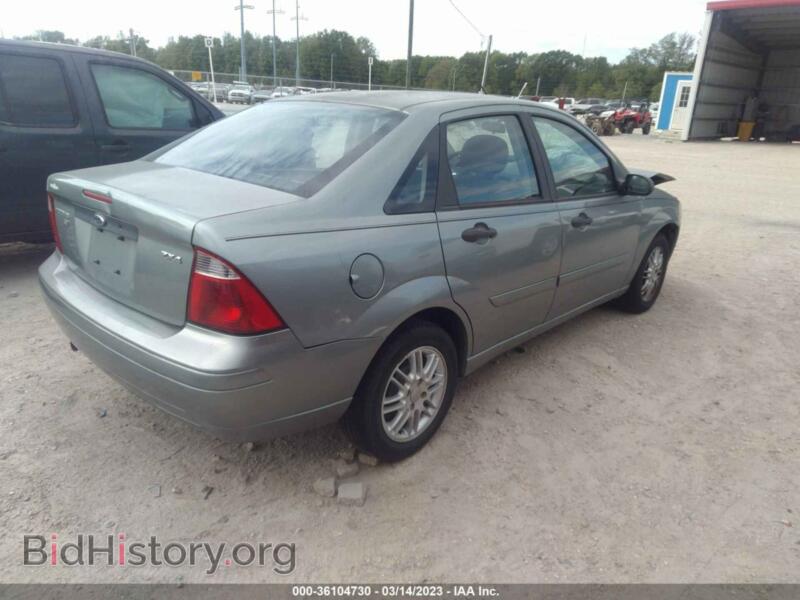 2006 Ford FOCUS (VIN 1FAFP34N26W242491) — photo 4 of 11