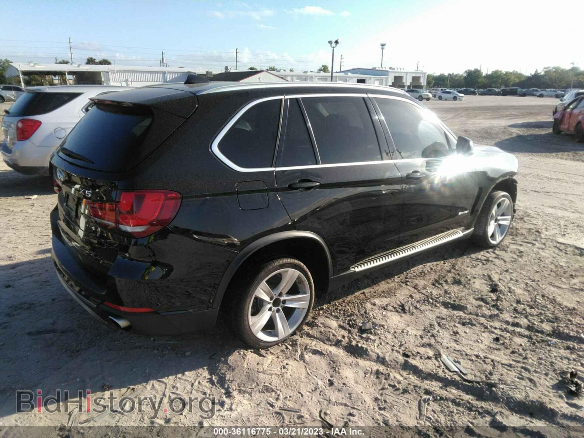 2014 BMW X5 - VIN: 5UXKR2C54E0C01409 - Фото 4