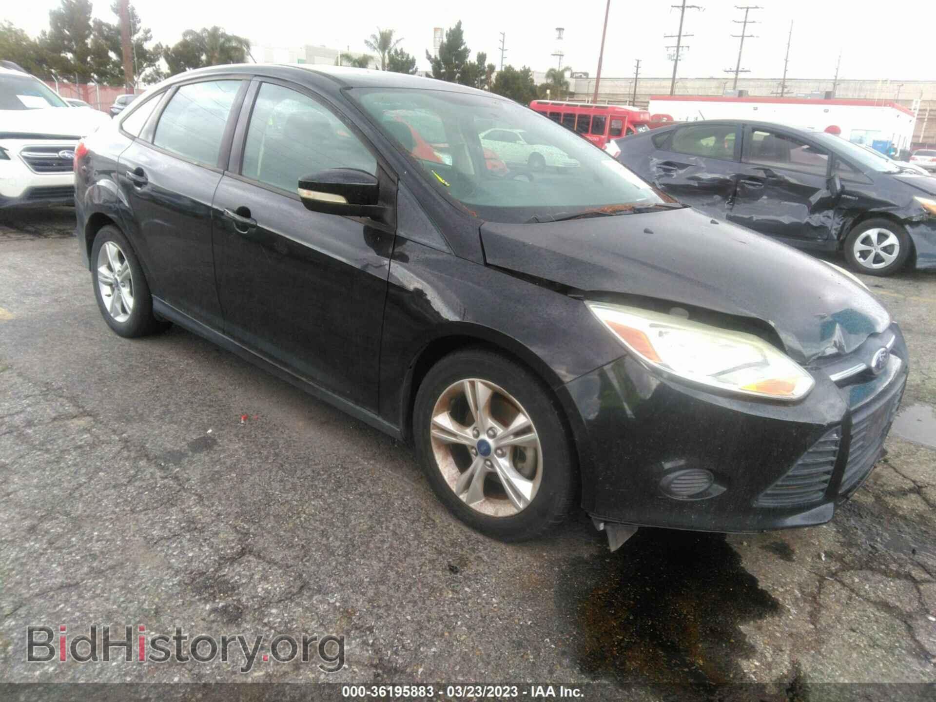 Фотография 1FADP3F28DL354575 - FORD FOCUS 2013
