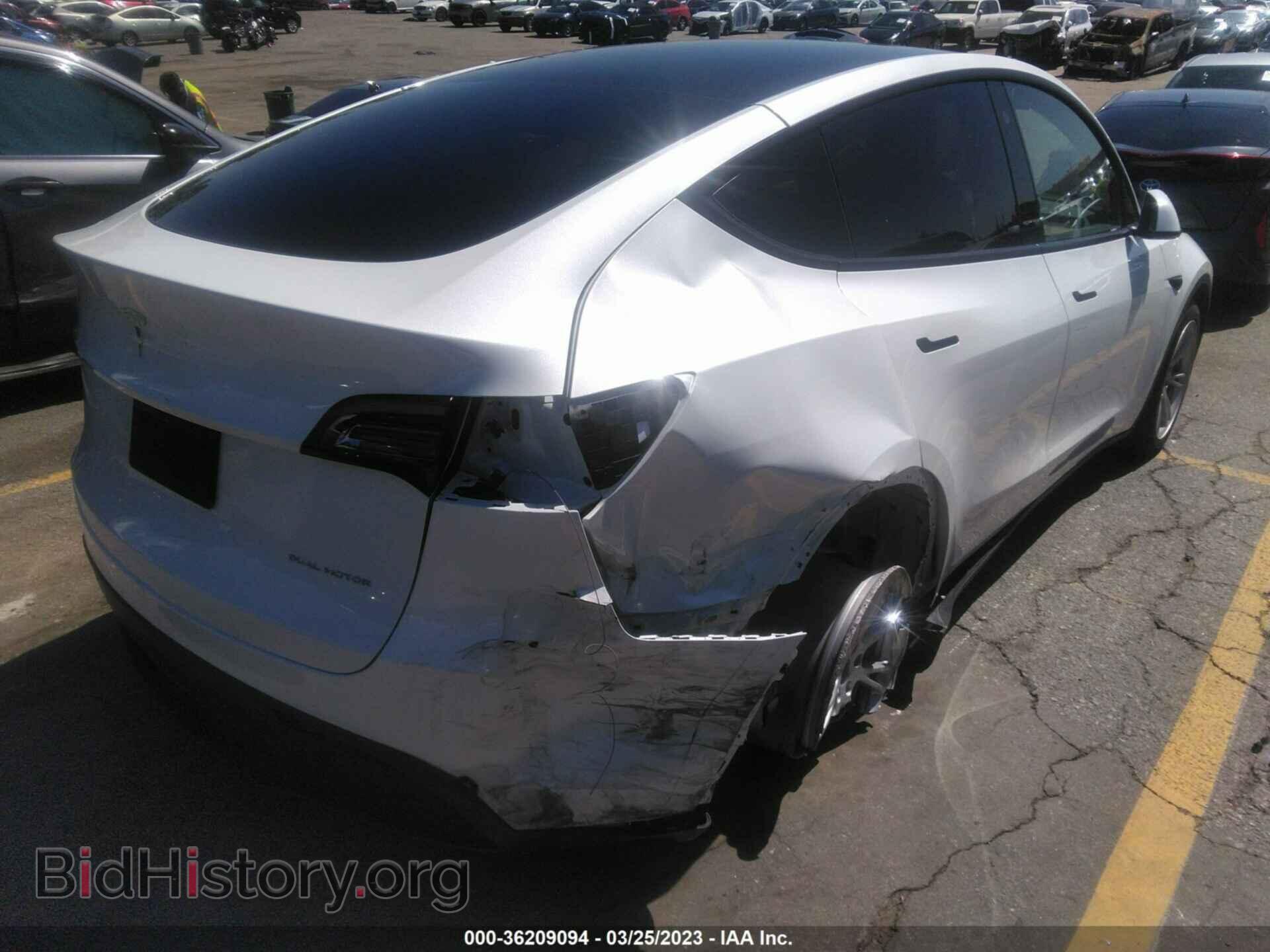2023 TESLA MODEL Y - VIN: 7SAYGAEEXPF622841 - Photo 4
