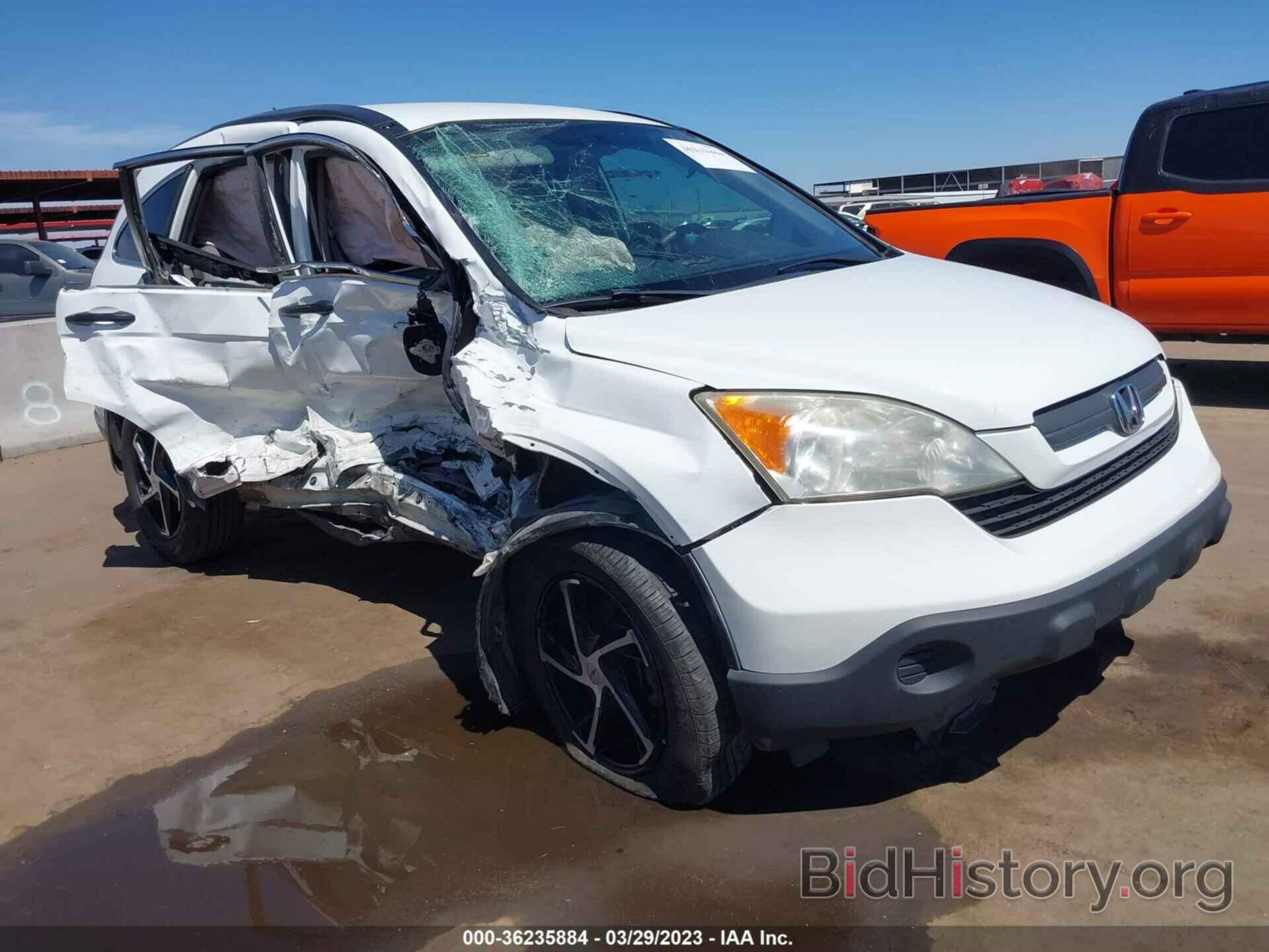 Photo JHLRE38337C044059 - HONDA CR-V 2007