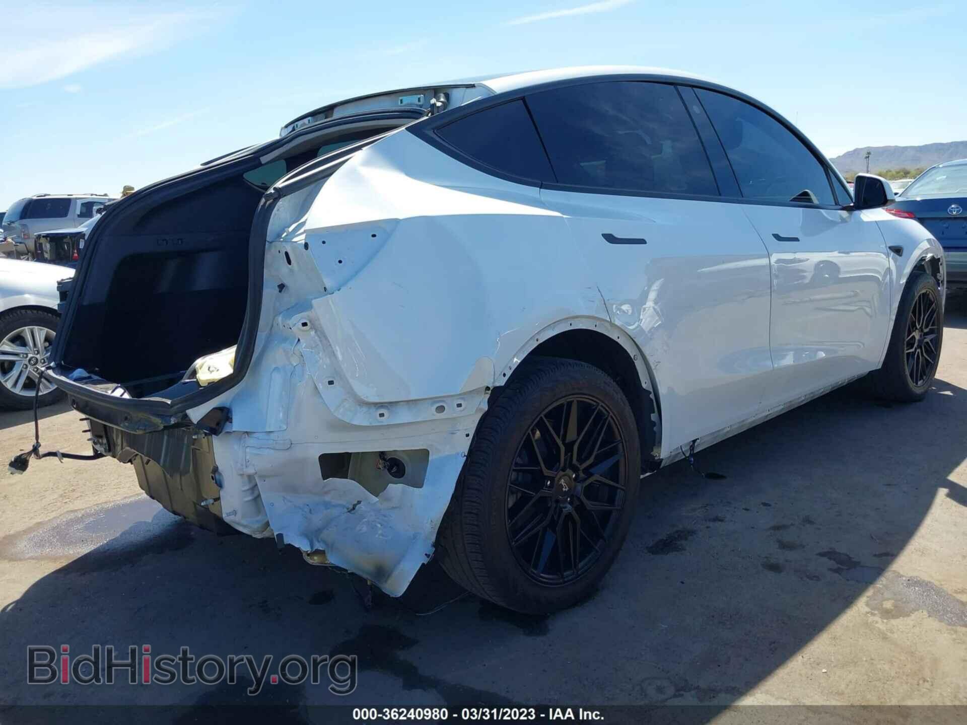 2021 TESLA MODEL Y - VIN: 5YJYGDED8MF103000 - Photo 4
