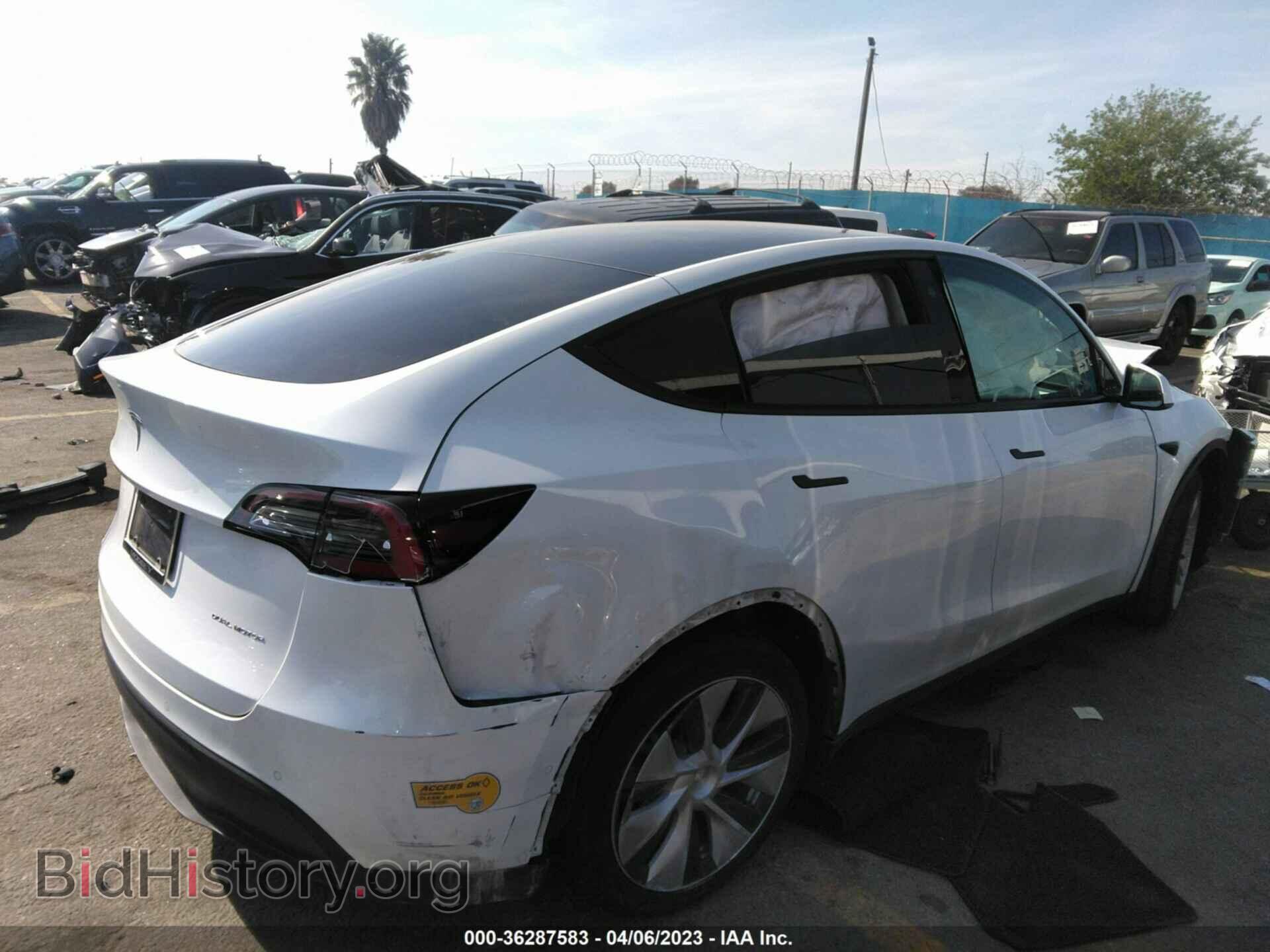 2022 TESLA MODEL Y - VIN: 7SAYGDEEXNF323395 - Photo 4