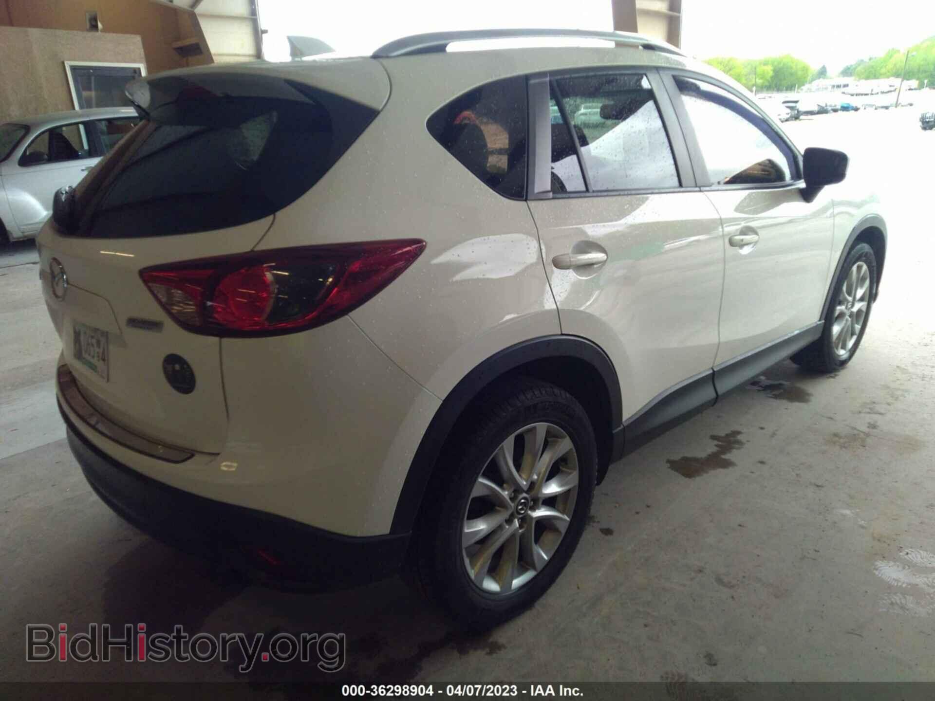 2014 MAZDA CX-5 - VIN: JM3KE2DY3E0408433 - Фото 4