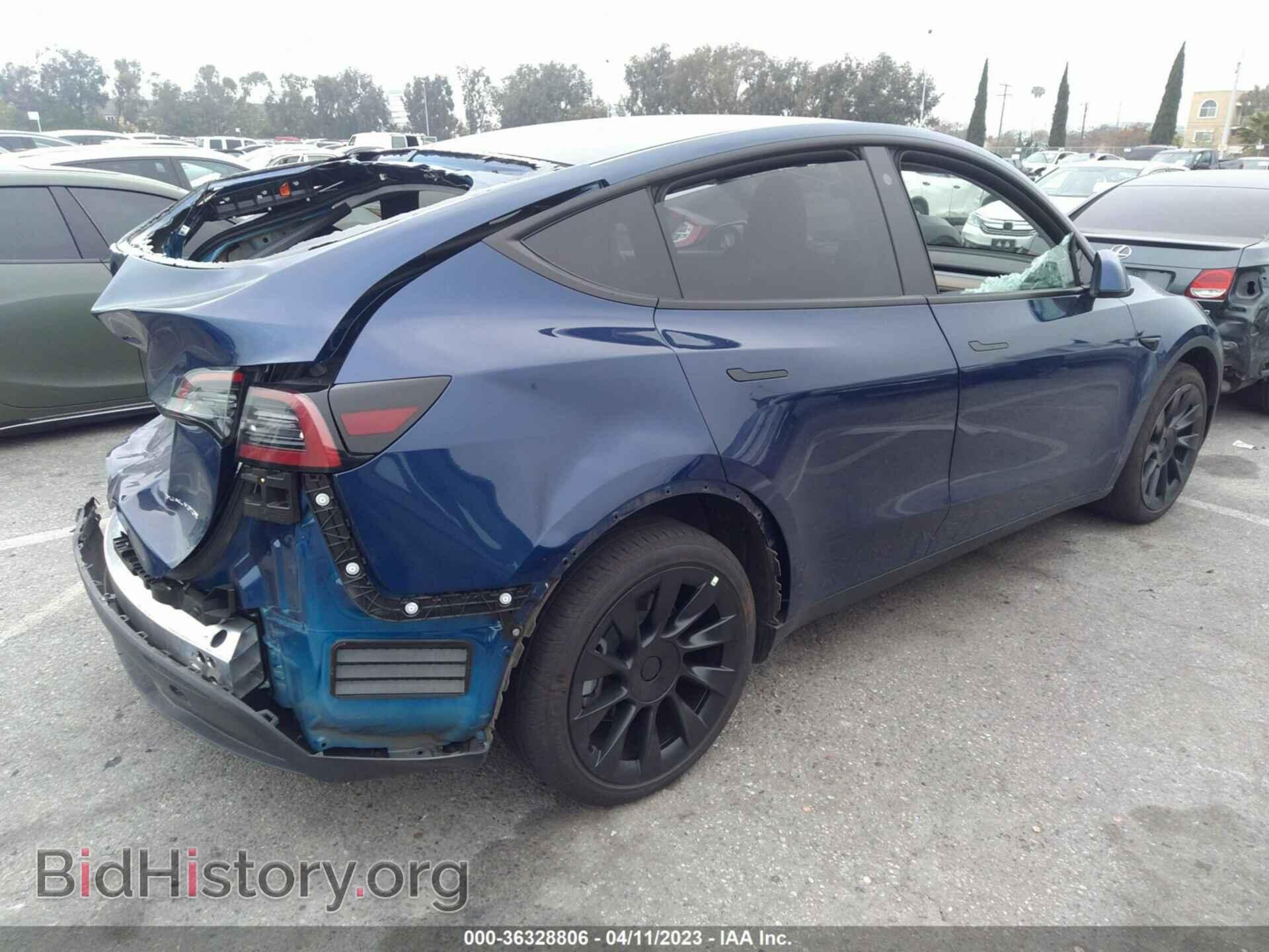 2022 TESLA MODEL Y - VIN: 7SAYGDEE3NF509330 - Photo 4