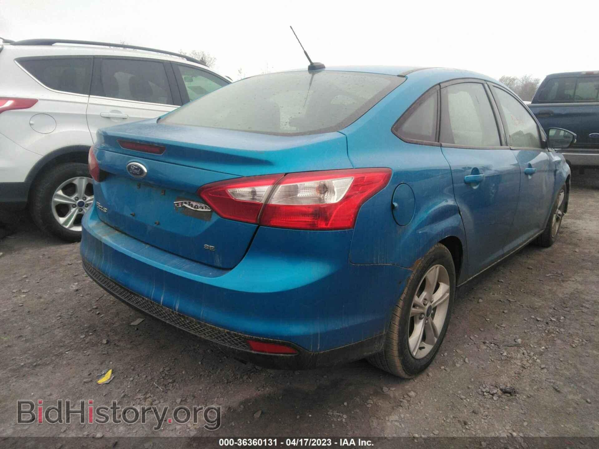 2014 FORD FOCUS - VIN: 1FADP3F2XEL449396 - Photo 4