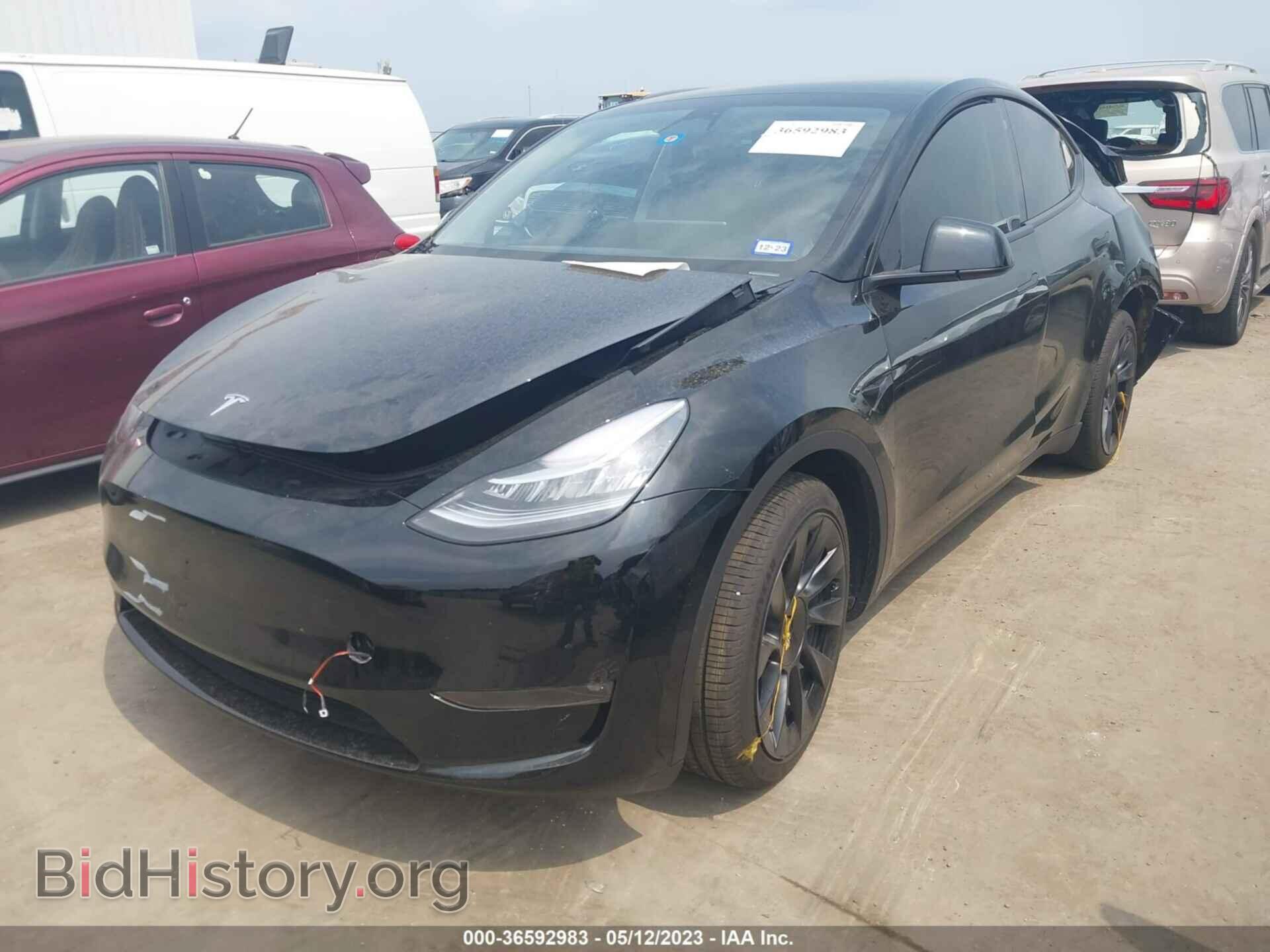 2023 TESLA MODEL Y - VIN: 7SAYGAEE2PF609937 - Photo 2
