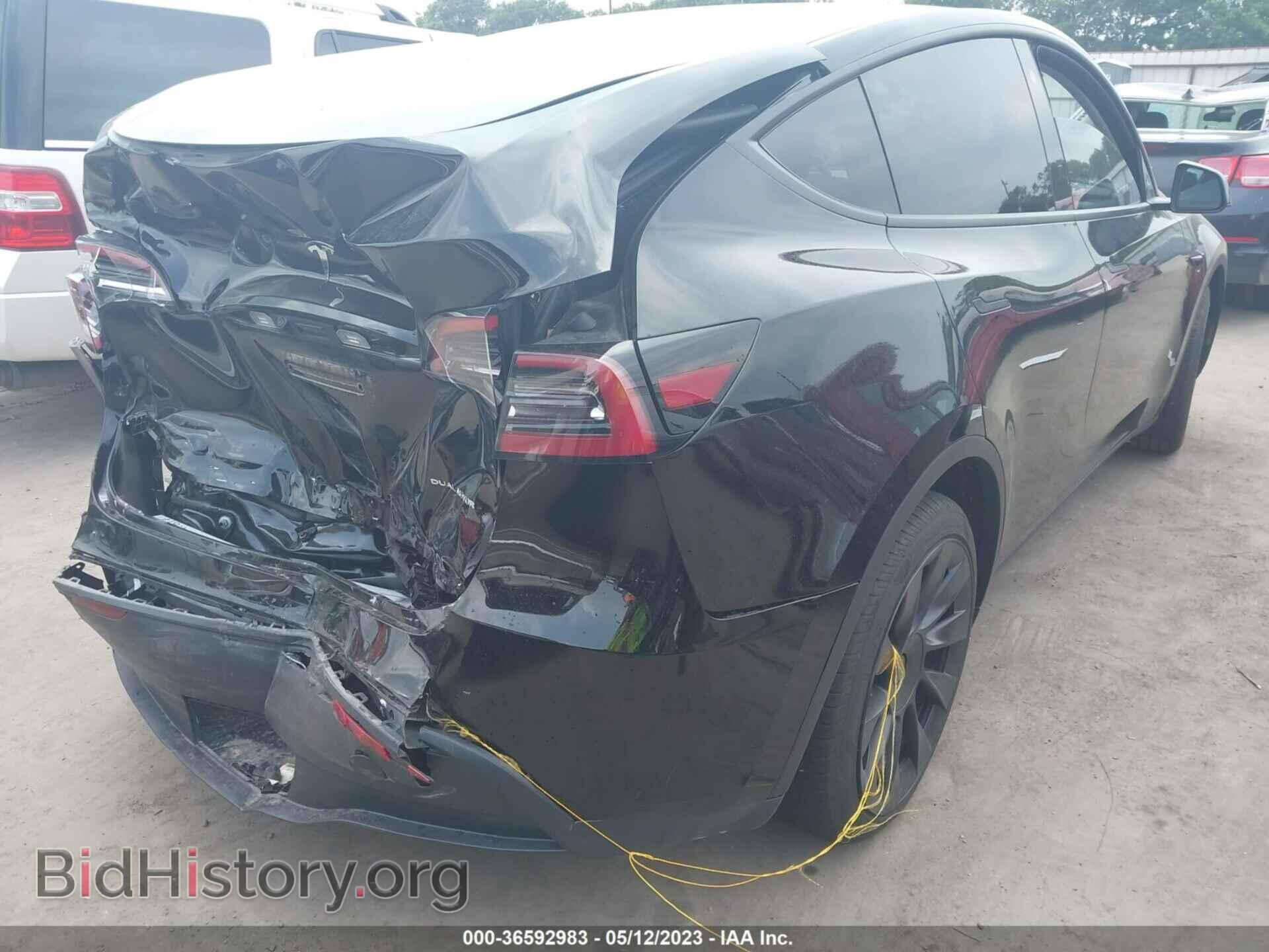 2023 TESLA MODEL Y - VIN: 7SAYGAEE2PF609937 - Photo 4