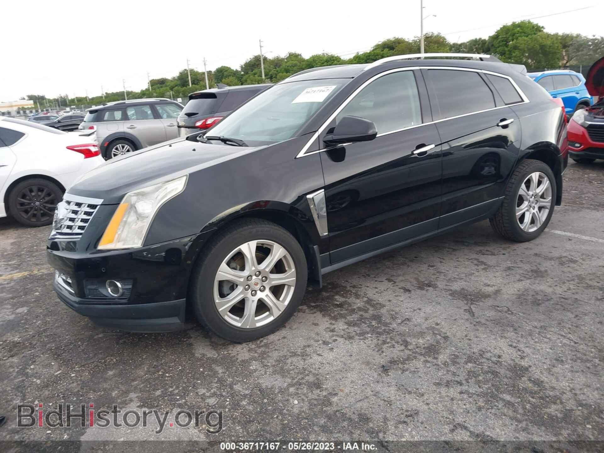2014 CADILLAC SRX - VIN: 3GYFNCE36ES526529 - Photo 2
