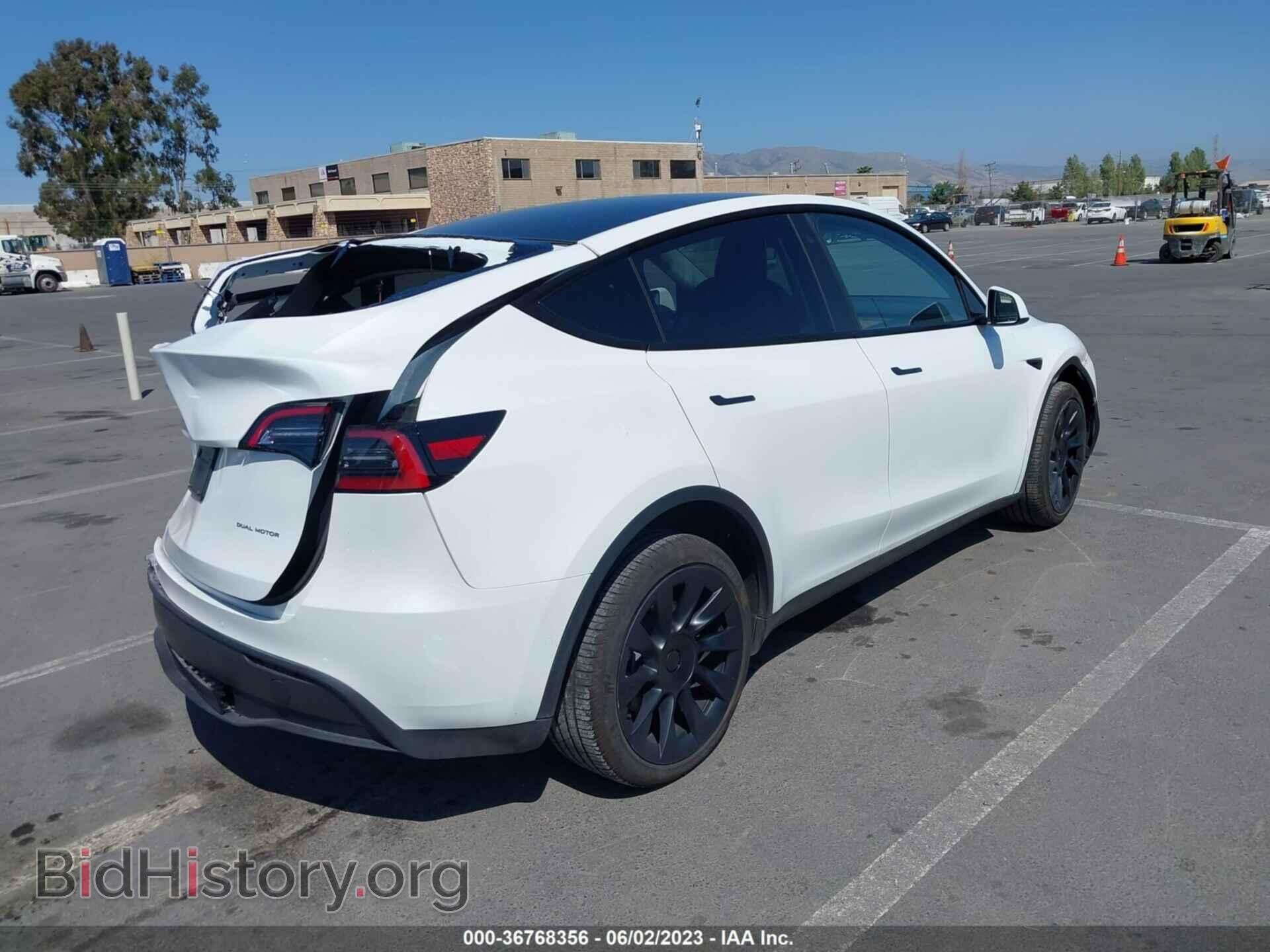 2022 TESLA MODEL Y - VIN: 7SAYGDEE3NF560715 - Photo 4