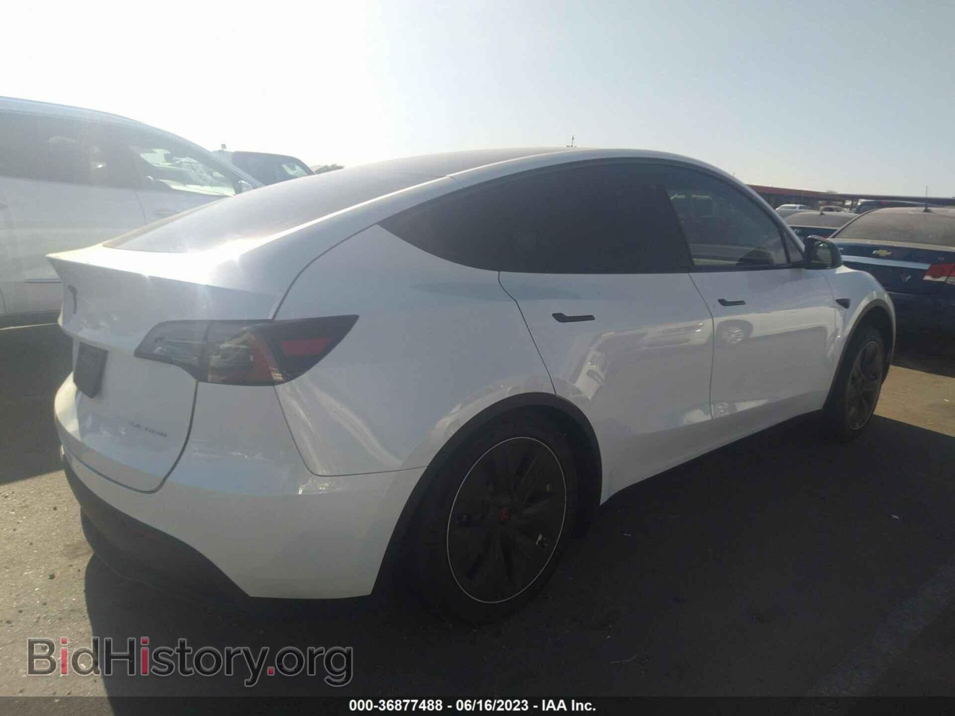 2023 TESLA MODEL Y - VIN: 7SAYGDEEXPA105571 - Фото 4