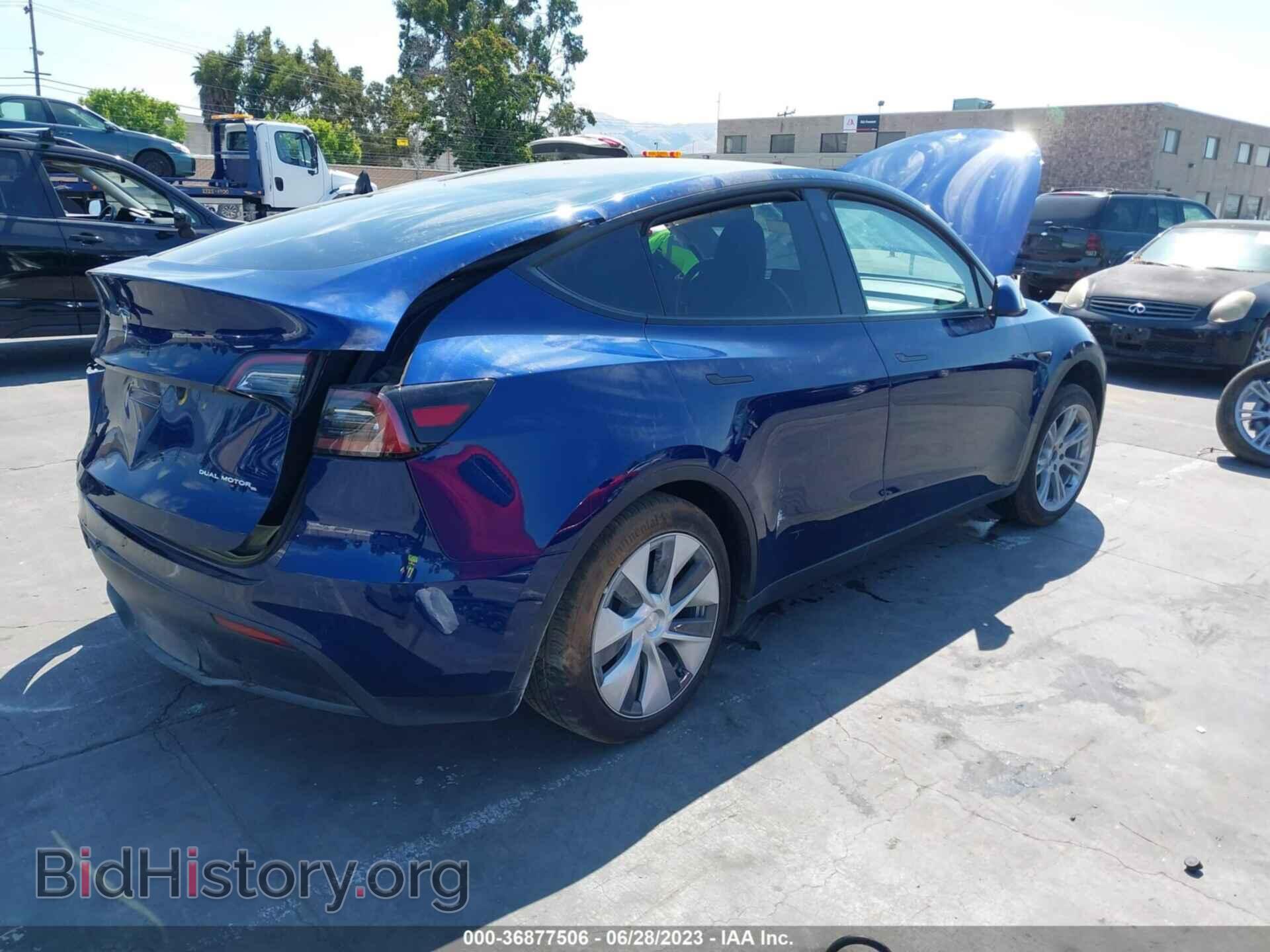 2023 TESLA MODEL Y - VIN: 7SAYGDEE7PF591422 - Фото 4