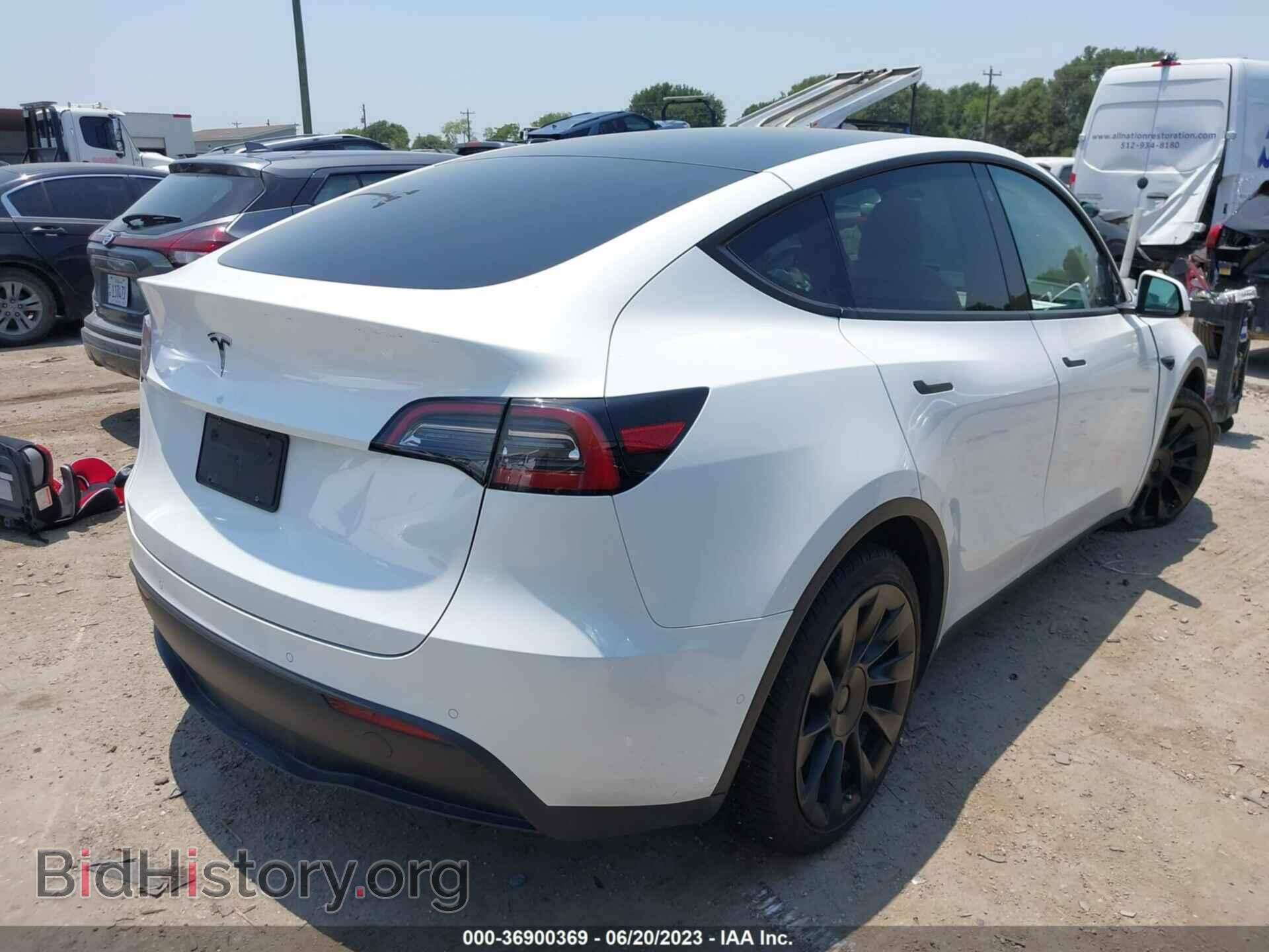 2021 TESLA MODEL Y - VIN: 5YJYGAEE2MF189914 - Photo 4