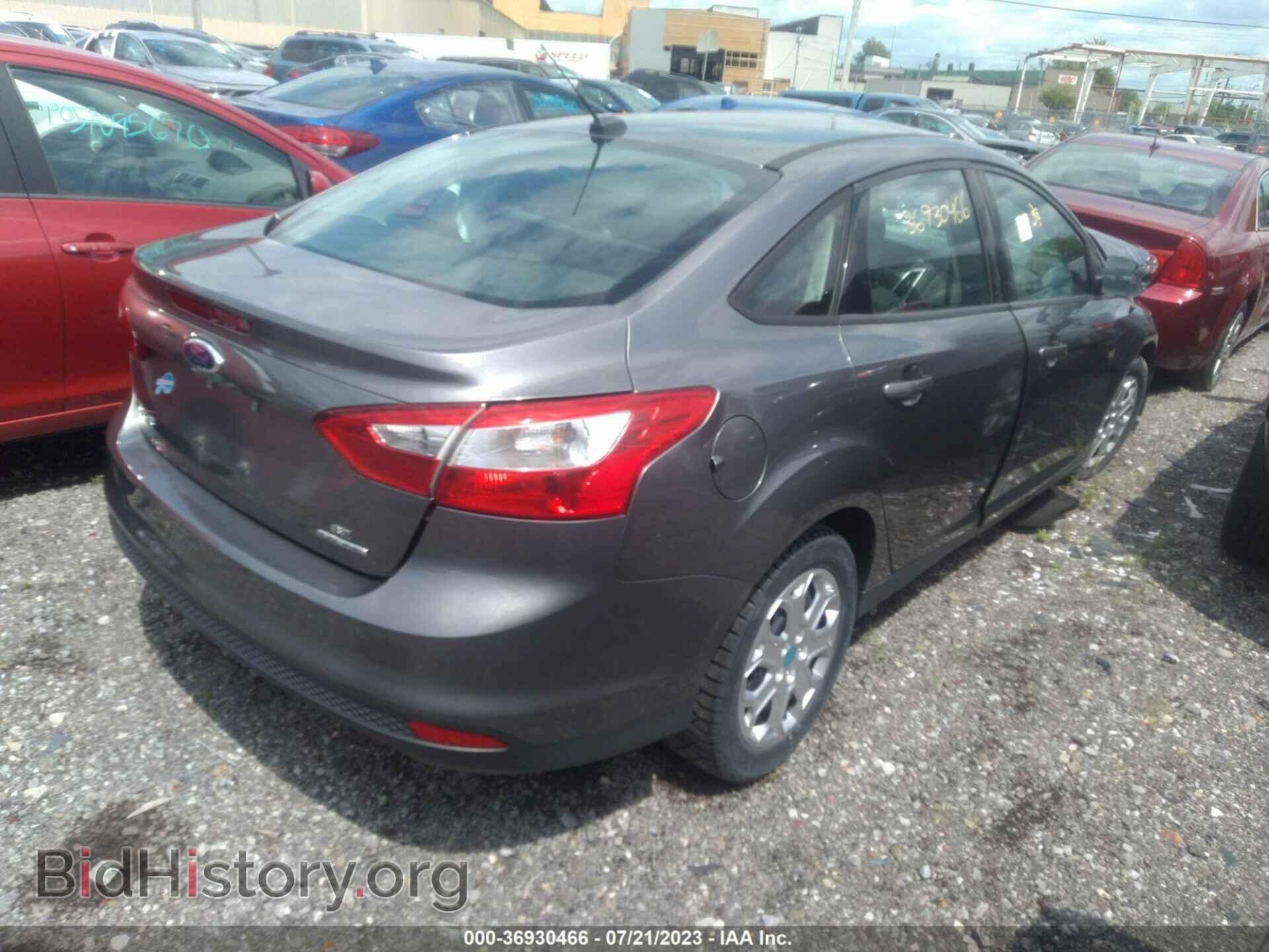 2014 FORD FOCUS - VIN: 1FADP3F23EL358129 - Photo 4