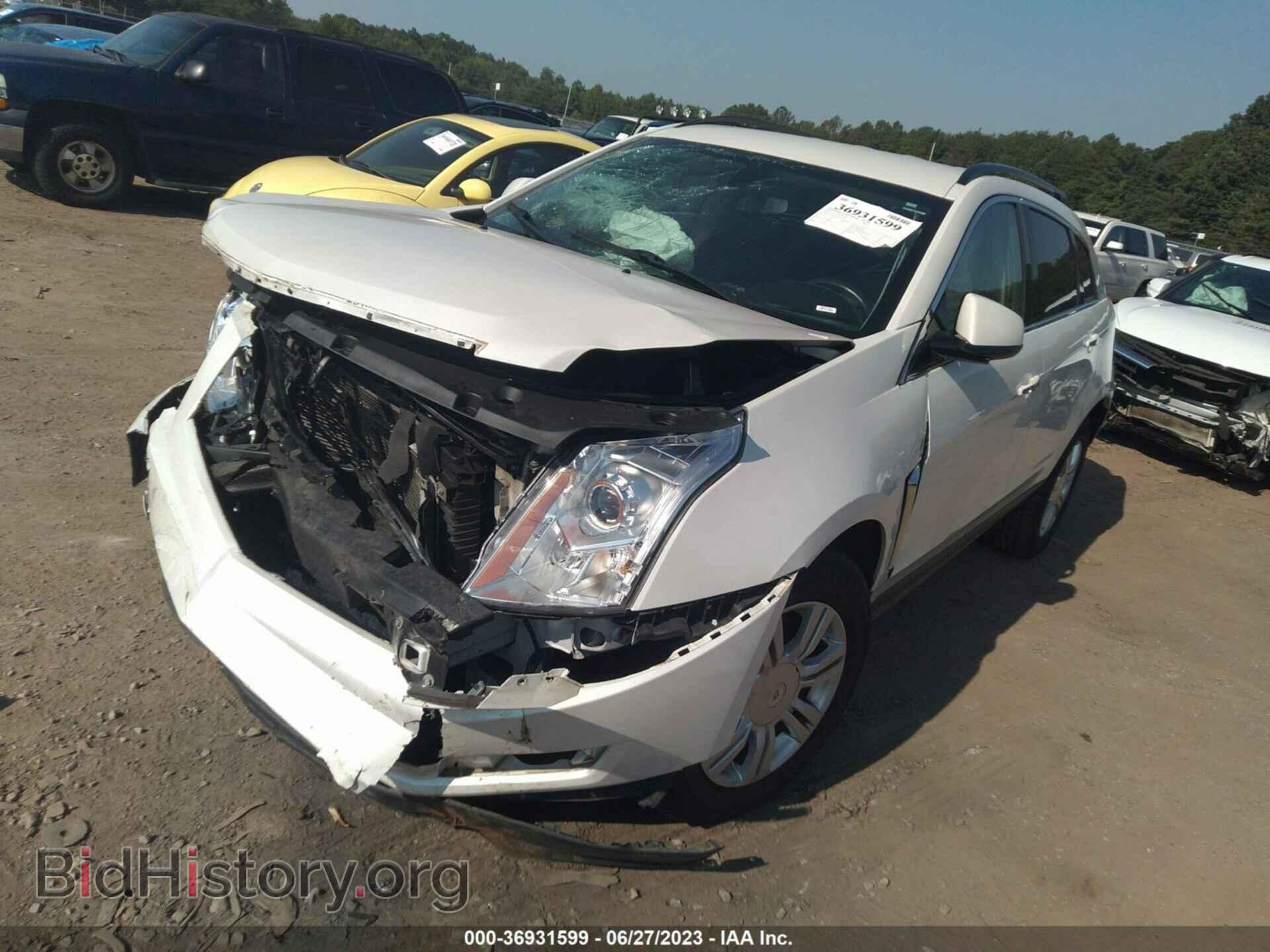 2014 CADILLAC SRX - VIN: 3GYFNAE39ES557164 - Фото 2