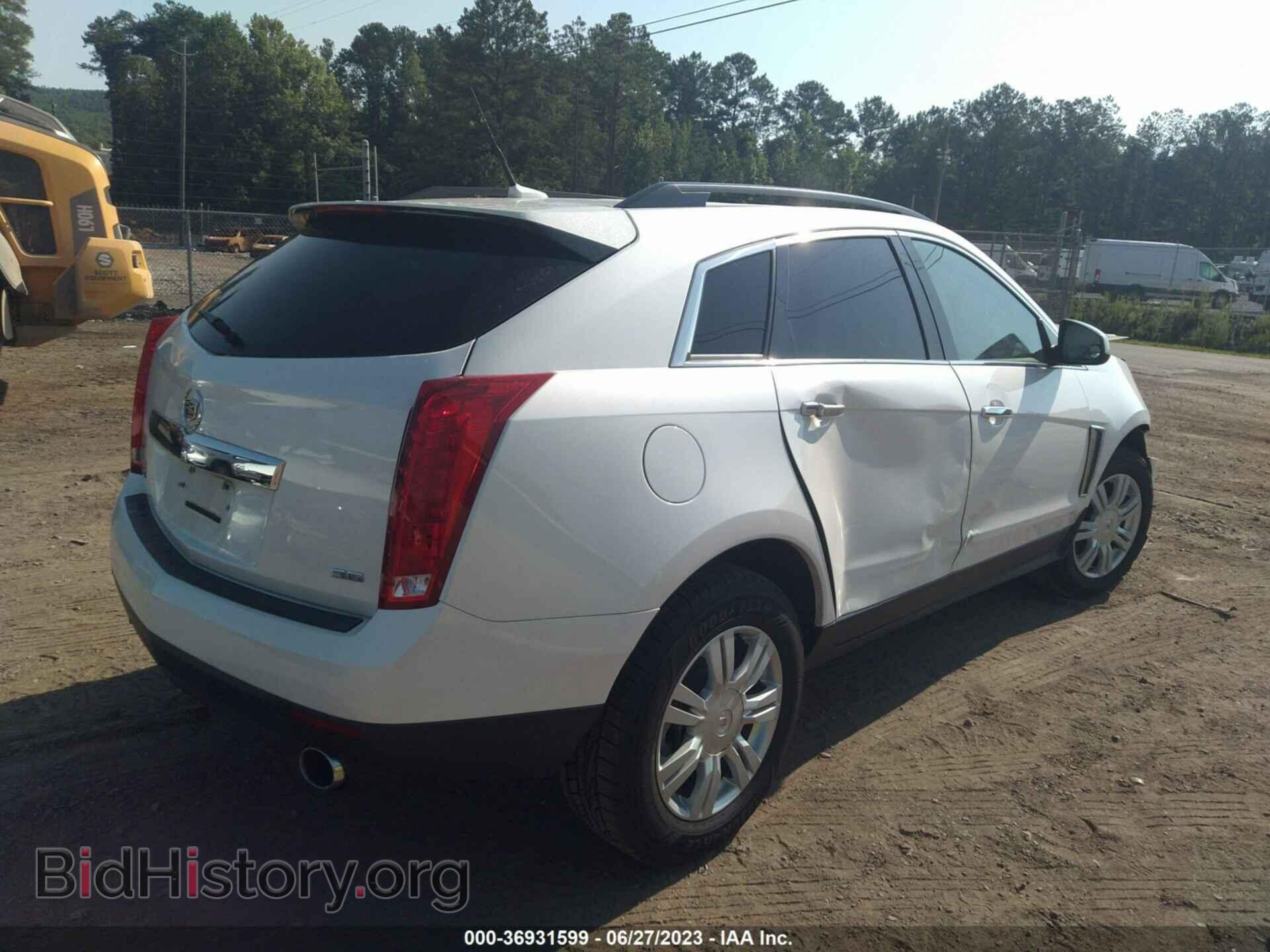 2014 CADILLAC SRX - VIN: 3GYFNAE39ES557164 - Фото 4