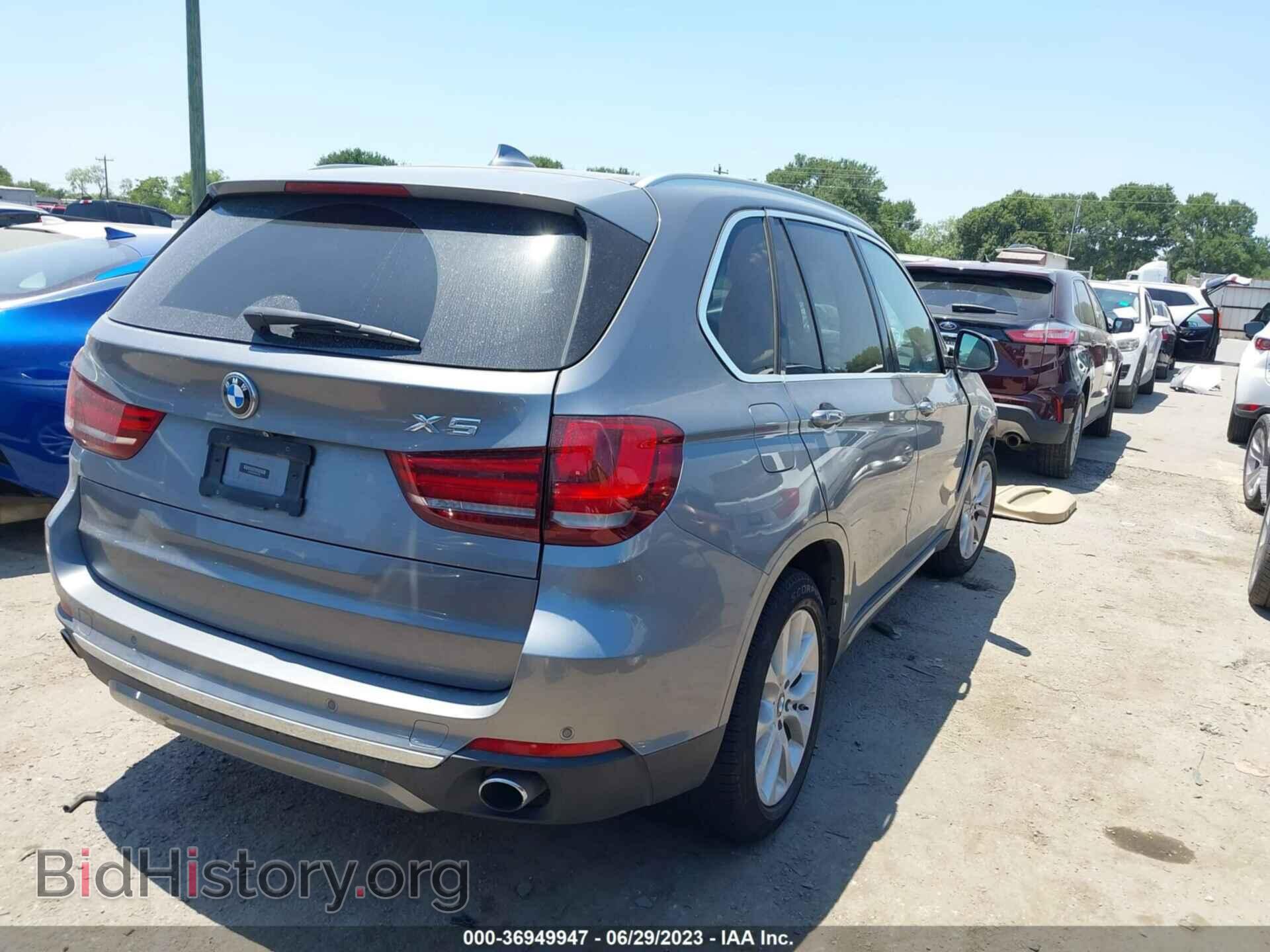 2014 BMW X5 - VIN: 5UXKR2C54E0H31329 - Фото 4