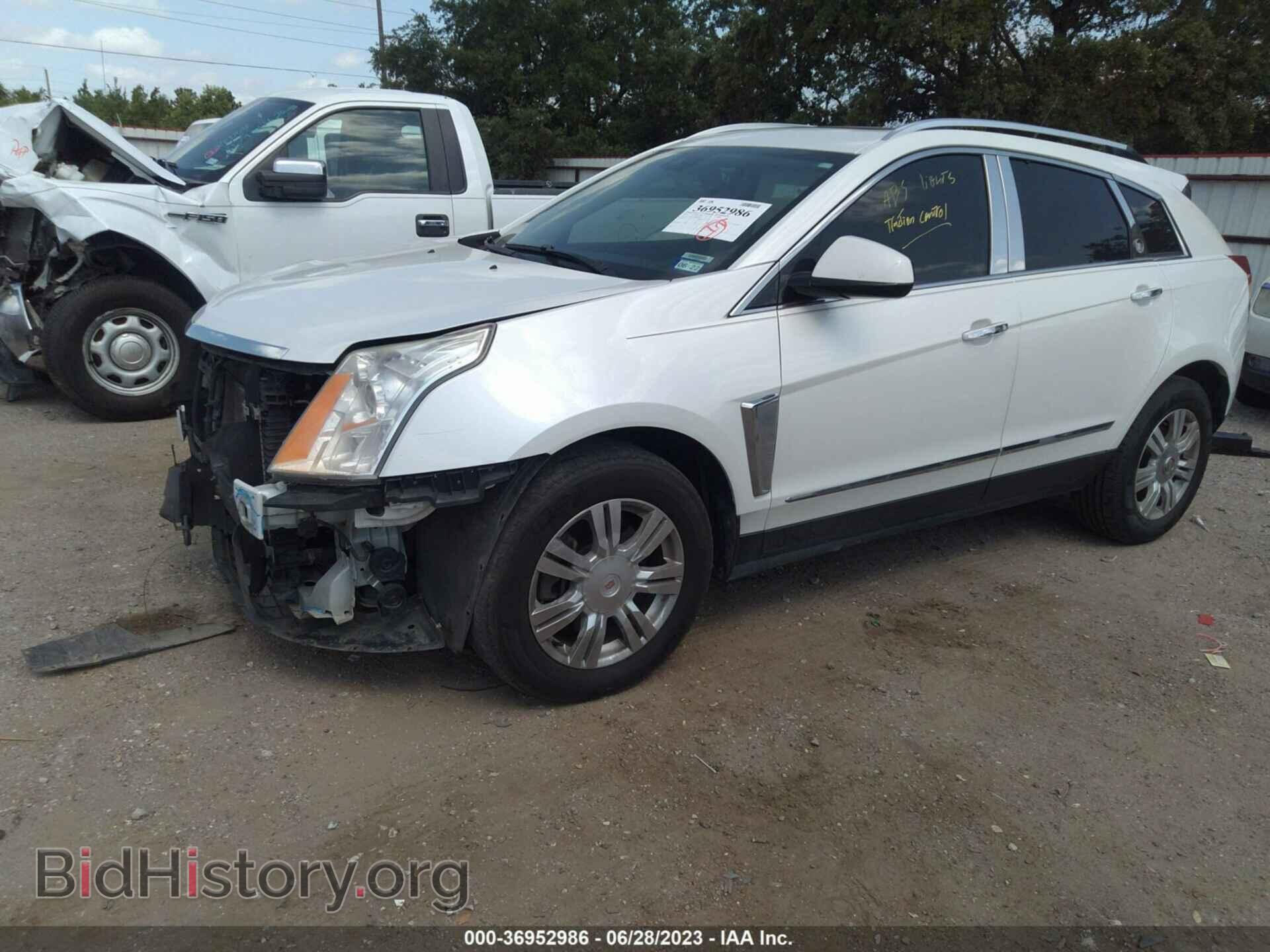2013 CADILLAC SRX - VIN: 3GYFNCE37DS627500 - Photo 2