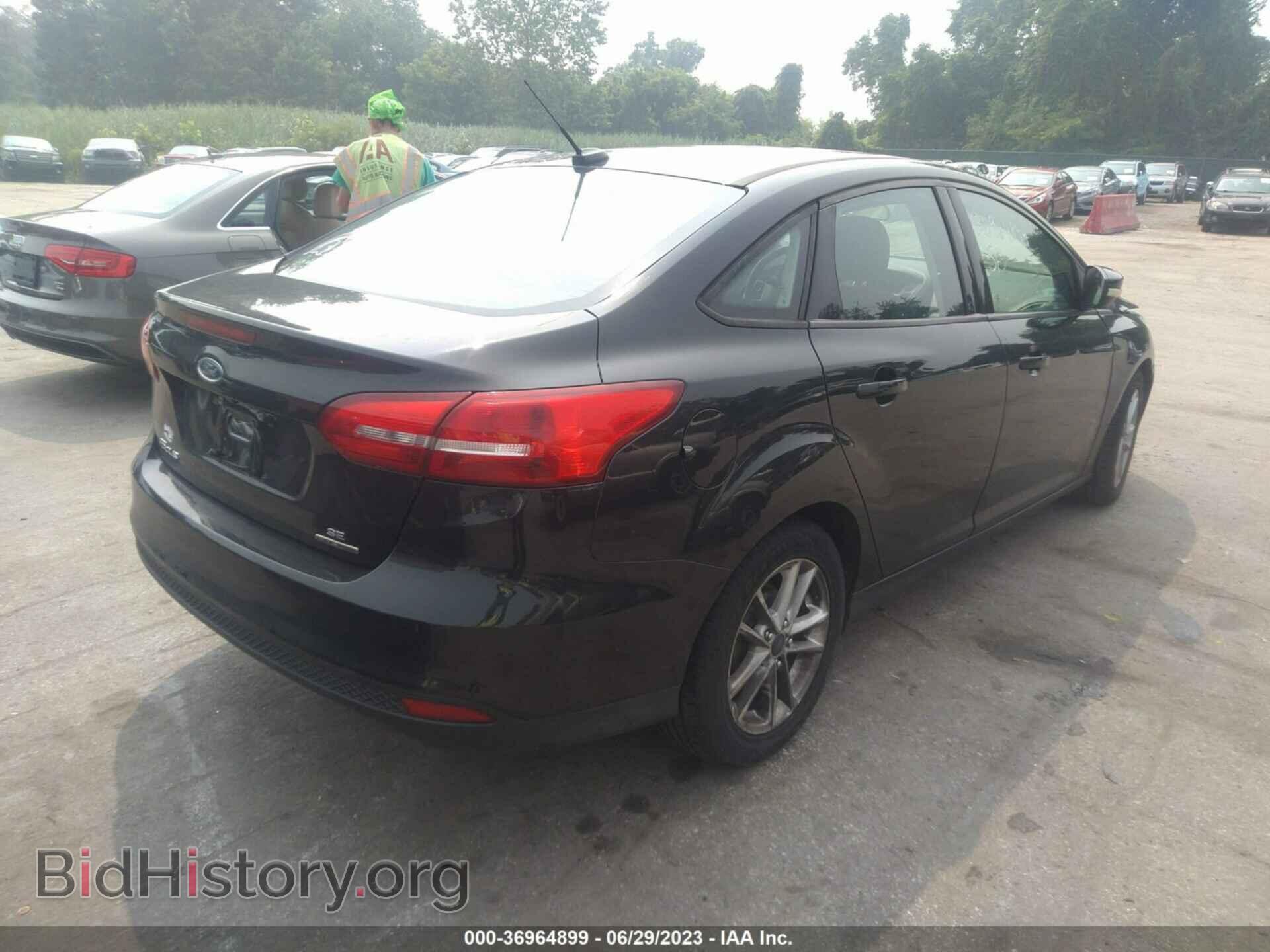 2015 FORD FOCUS - VIN: 1FADP3F22FL243247 - Photo 4