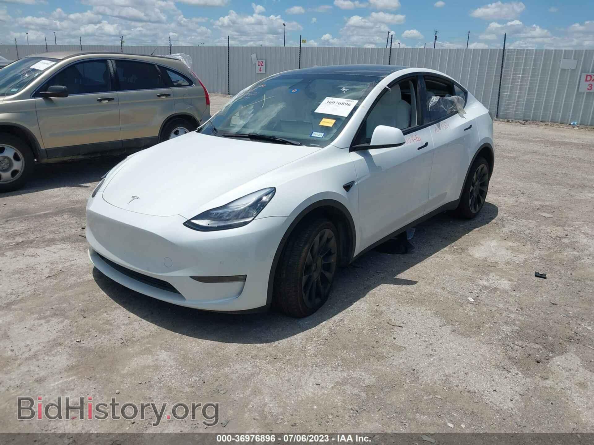 2022 TESLA MODEL Y - VIN: 7SAYGDEE3NF513765 - Photo 2