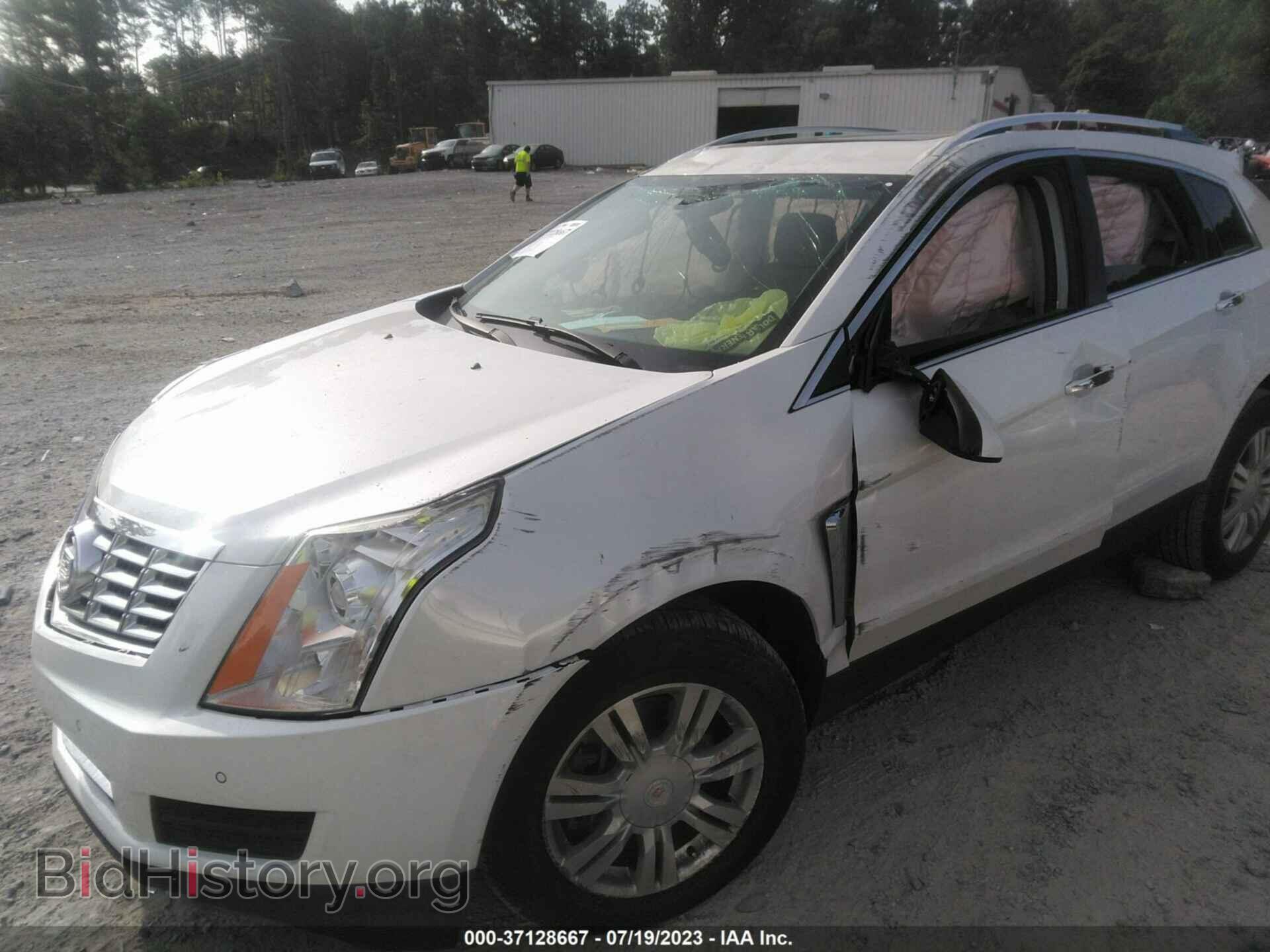 2014 CADILLAC SRX - VIN: 3GYFNBE31ES581870 - Фото 2