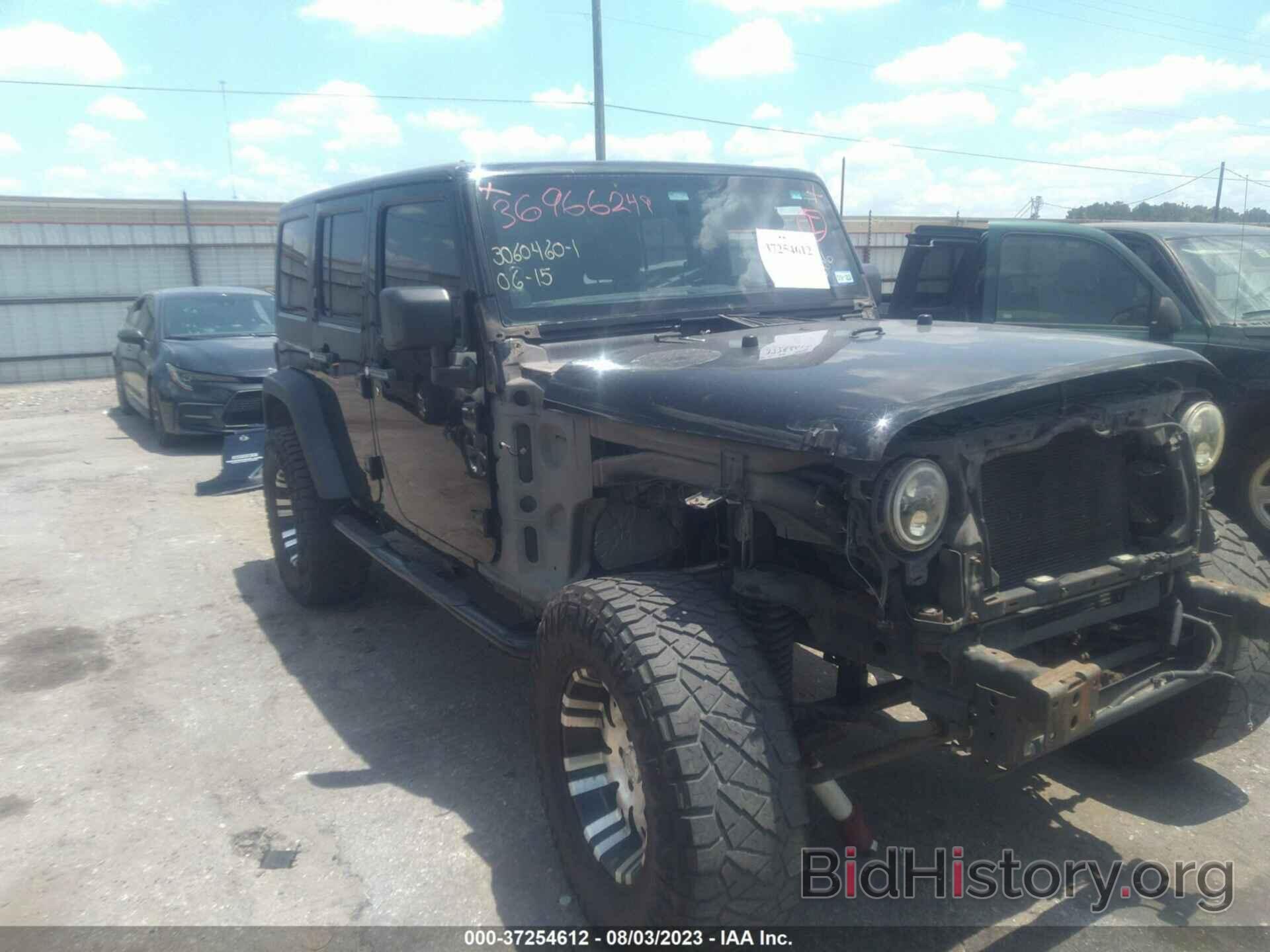 Photo 1J4HA3H11BL523506 - JEEP WRANGLER UNLIMITED 2011