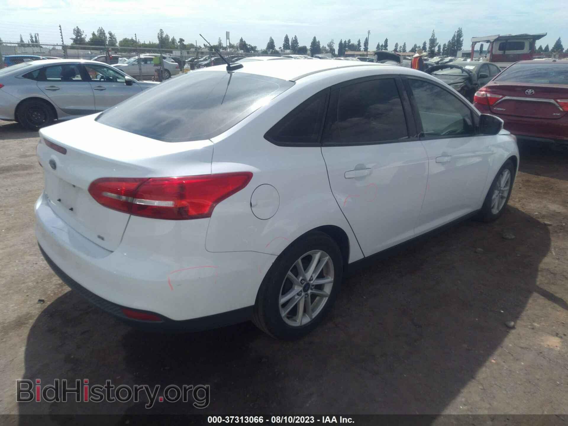 2017 FORD FOCUS - VIN: 1FADP3F24HL296437 - Photo 4