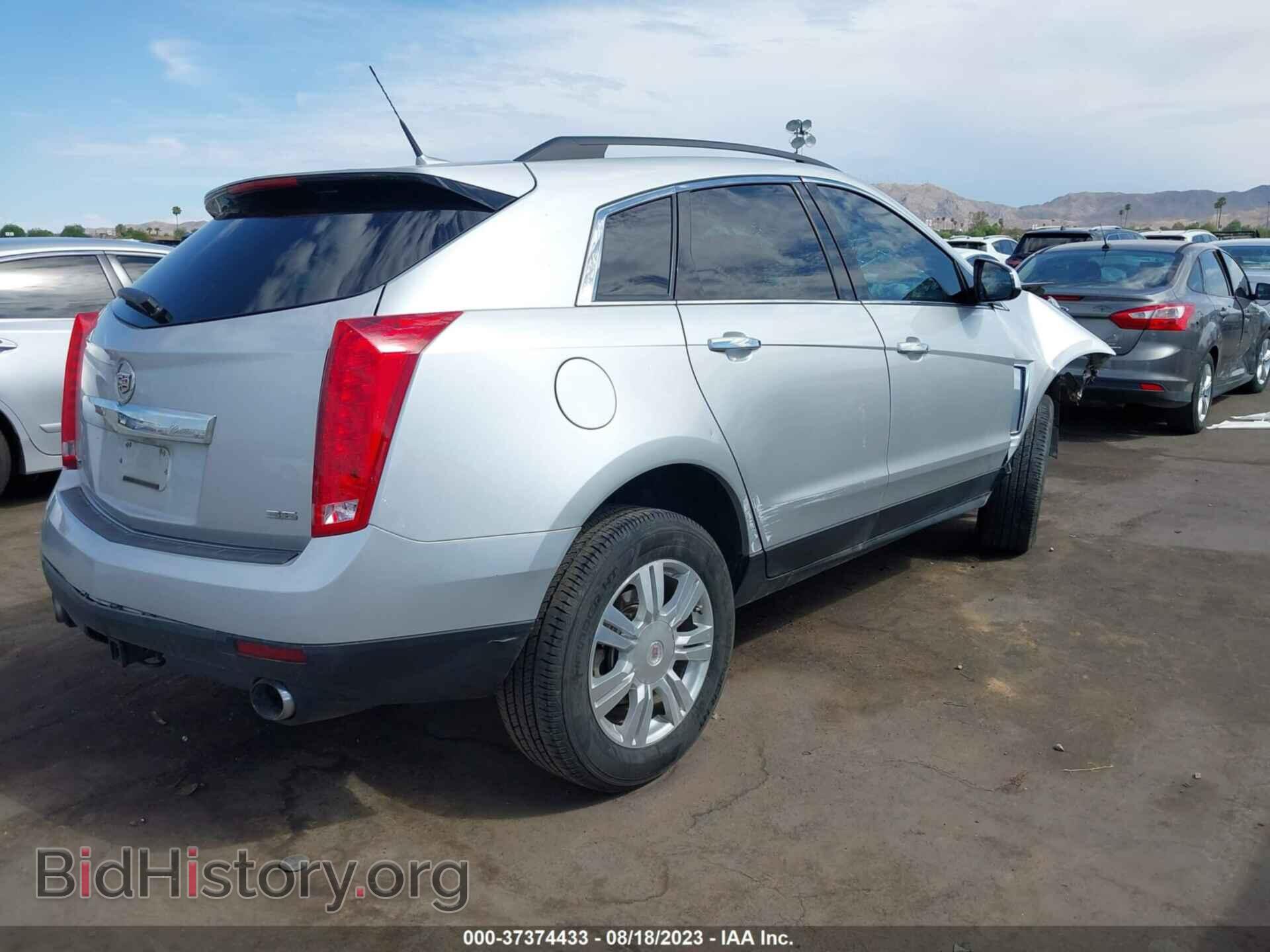 2014 CADILLAC SRX - VIN: 3GYFNAE36ES560510 - Photo 4